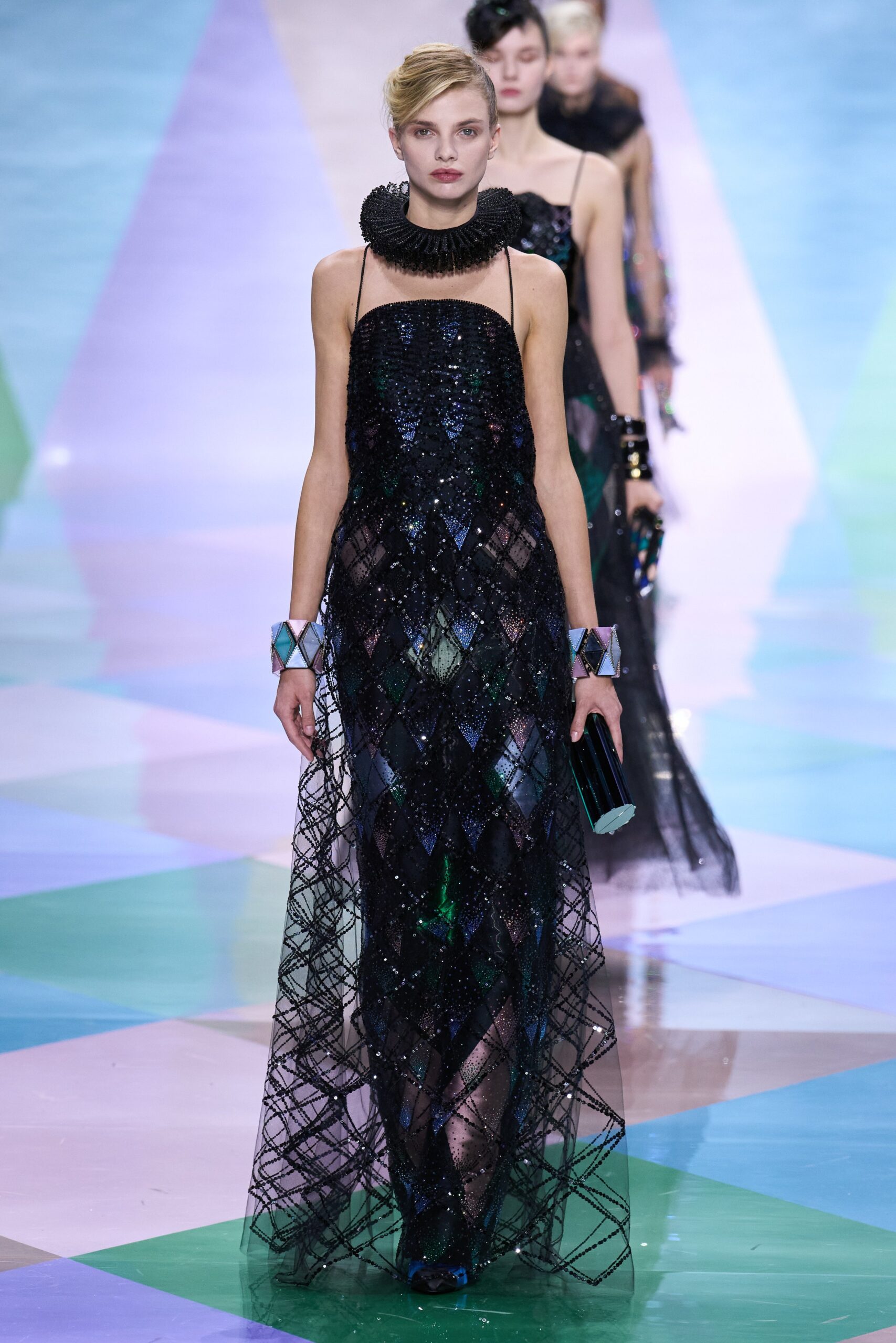 black sequin sleeveless gown