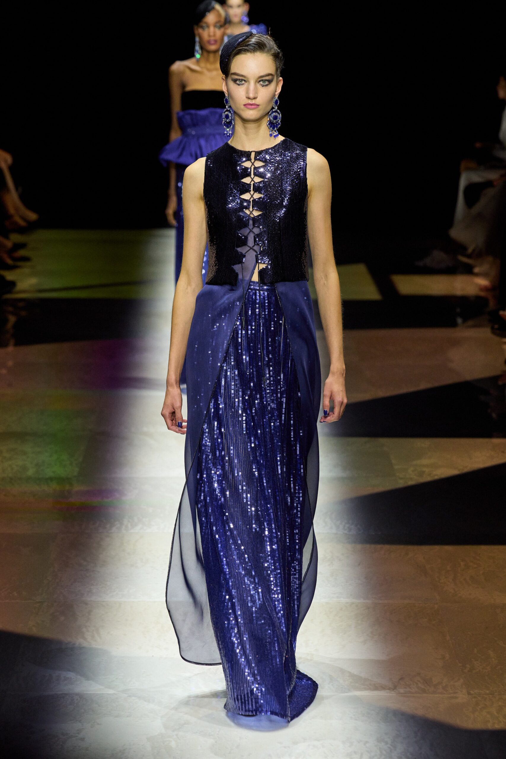 blue sequin gown with cape