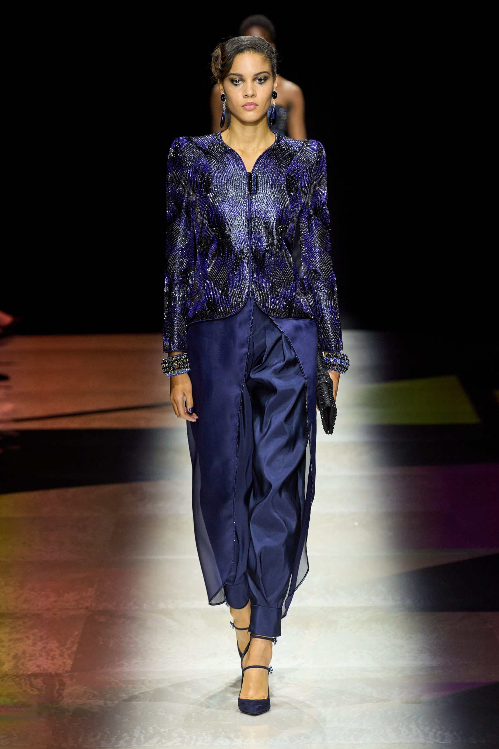 blue silk fitted jacket with wide-leg pants
