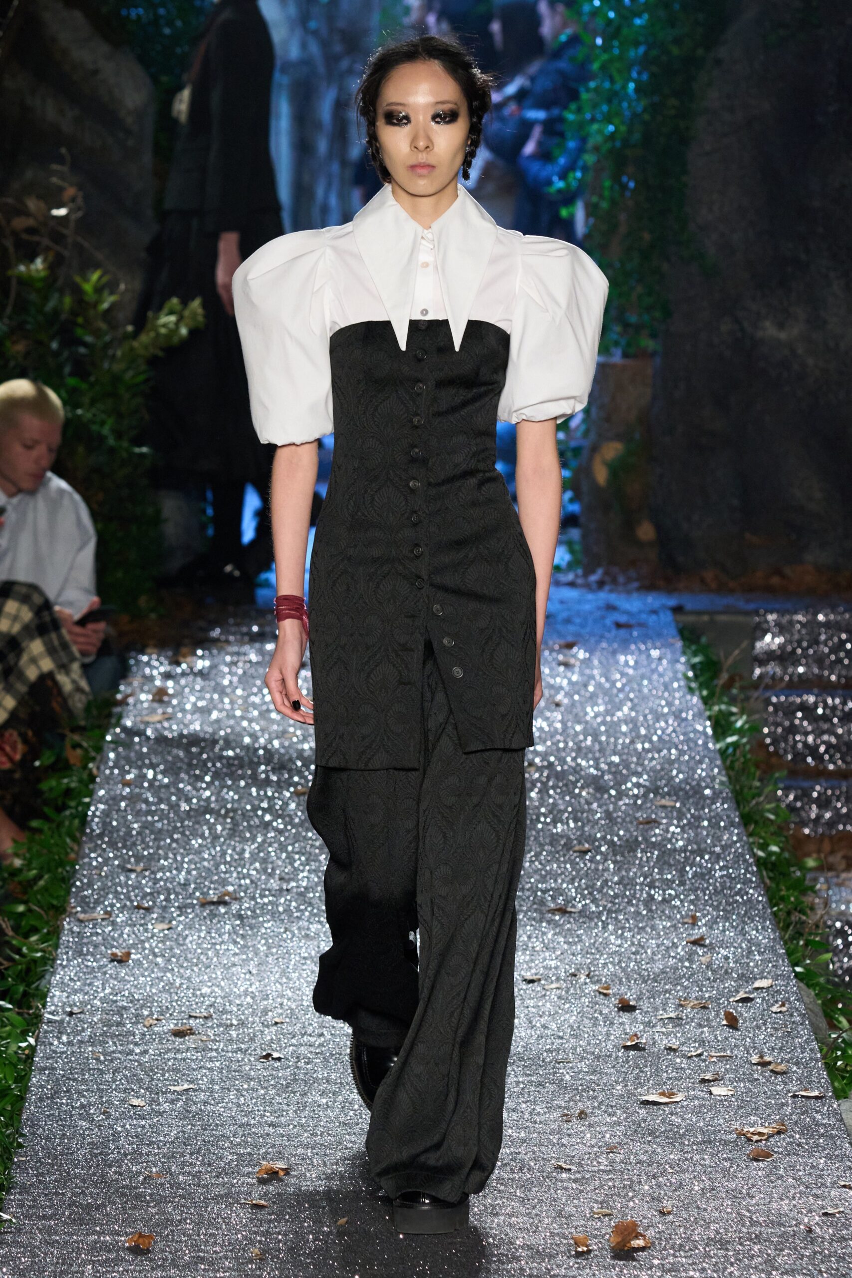 black fitted jumpsuit with white blouse