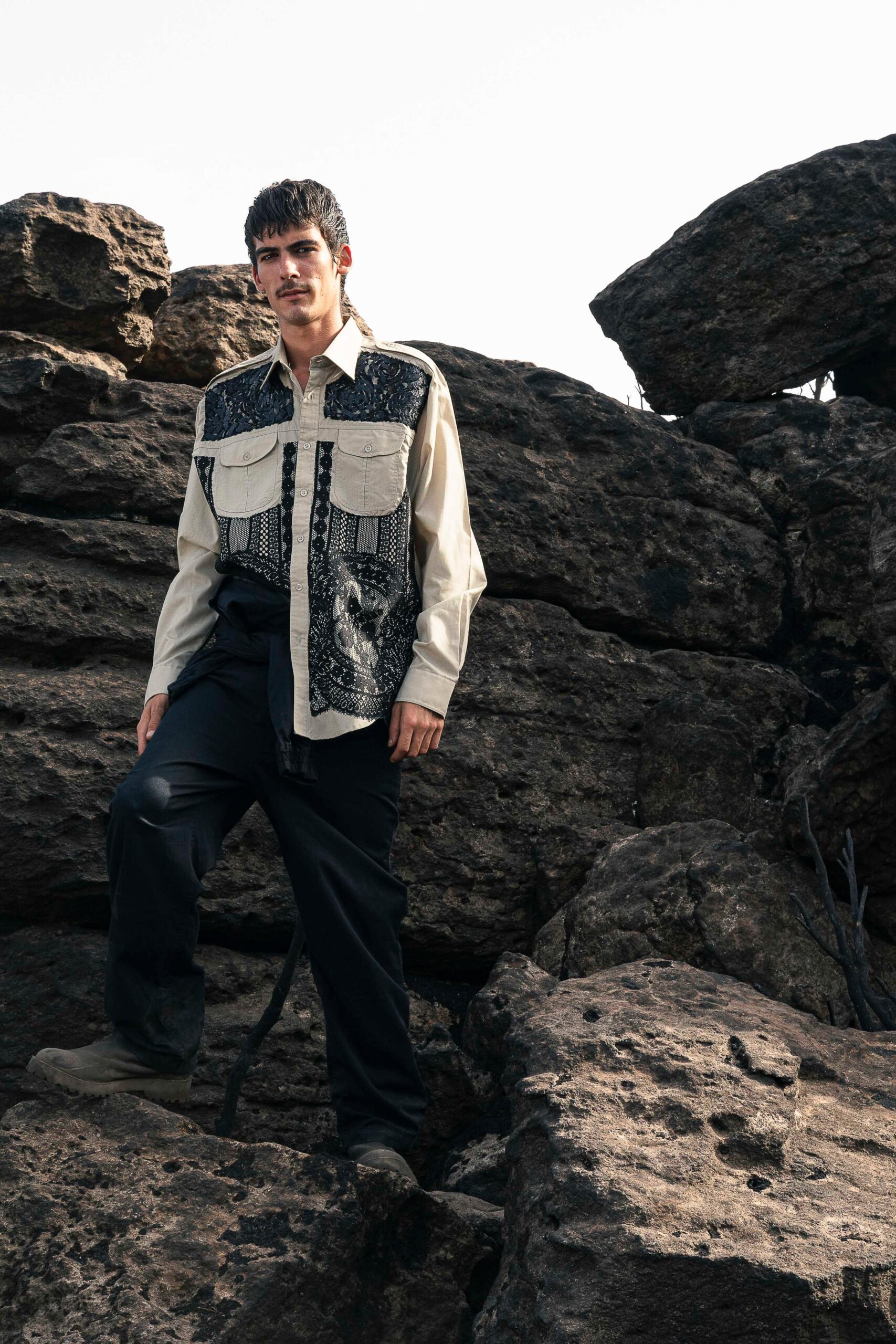 beige and black printed shirt with relaxed pants