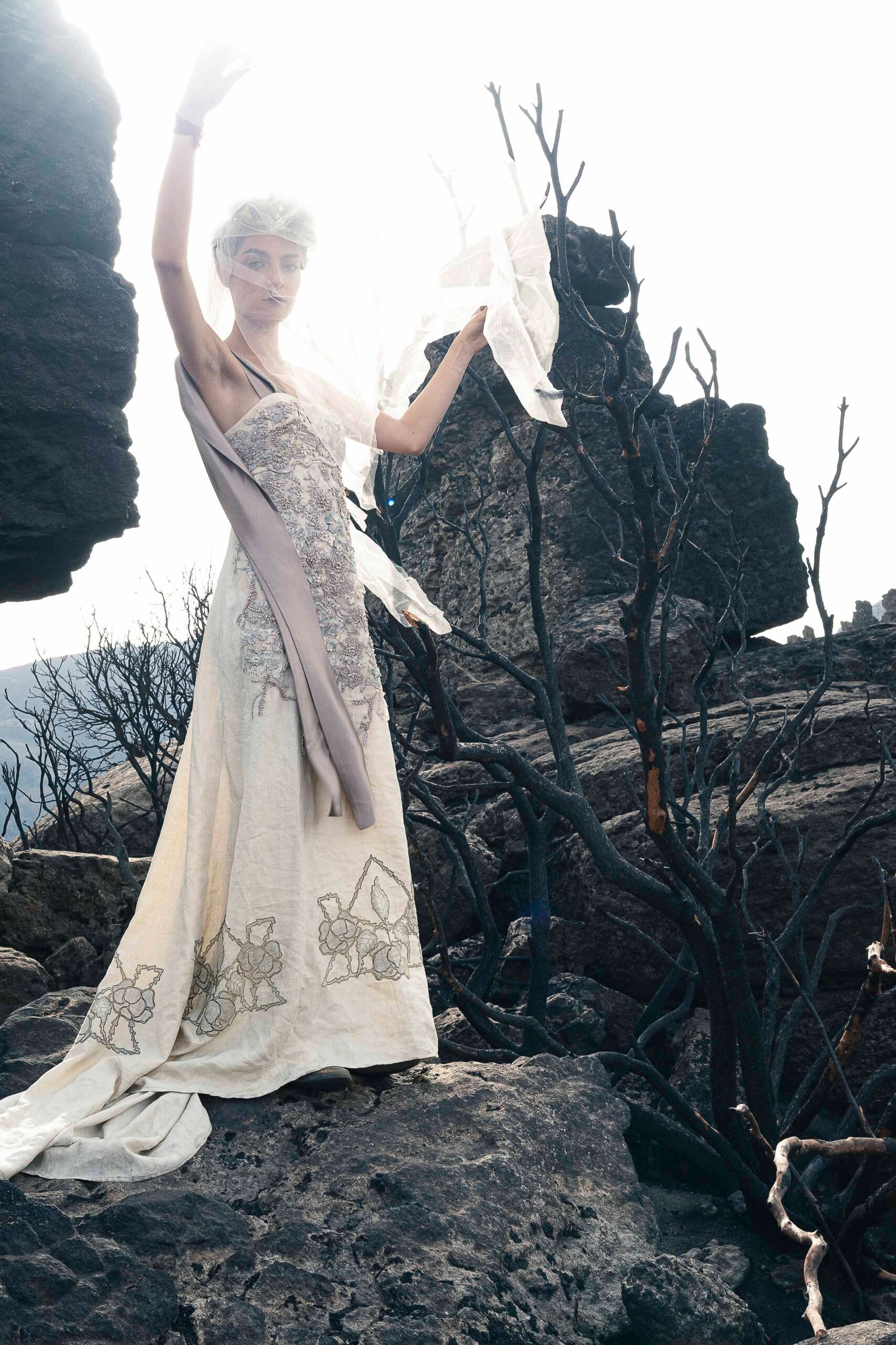 ivory silk strapless fitted embroidered flowing maxi gown