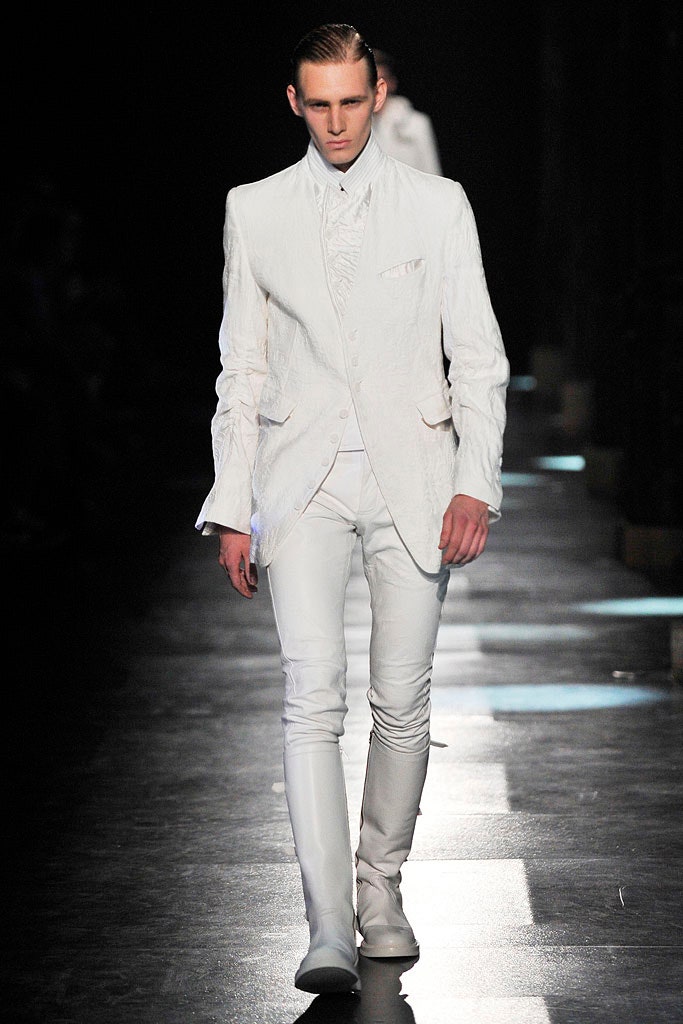 white fitted suit with boots