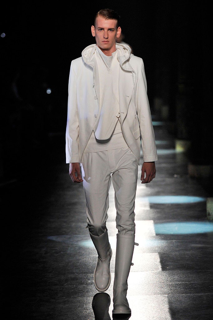 white fitted suit with boots