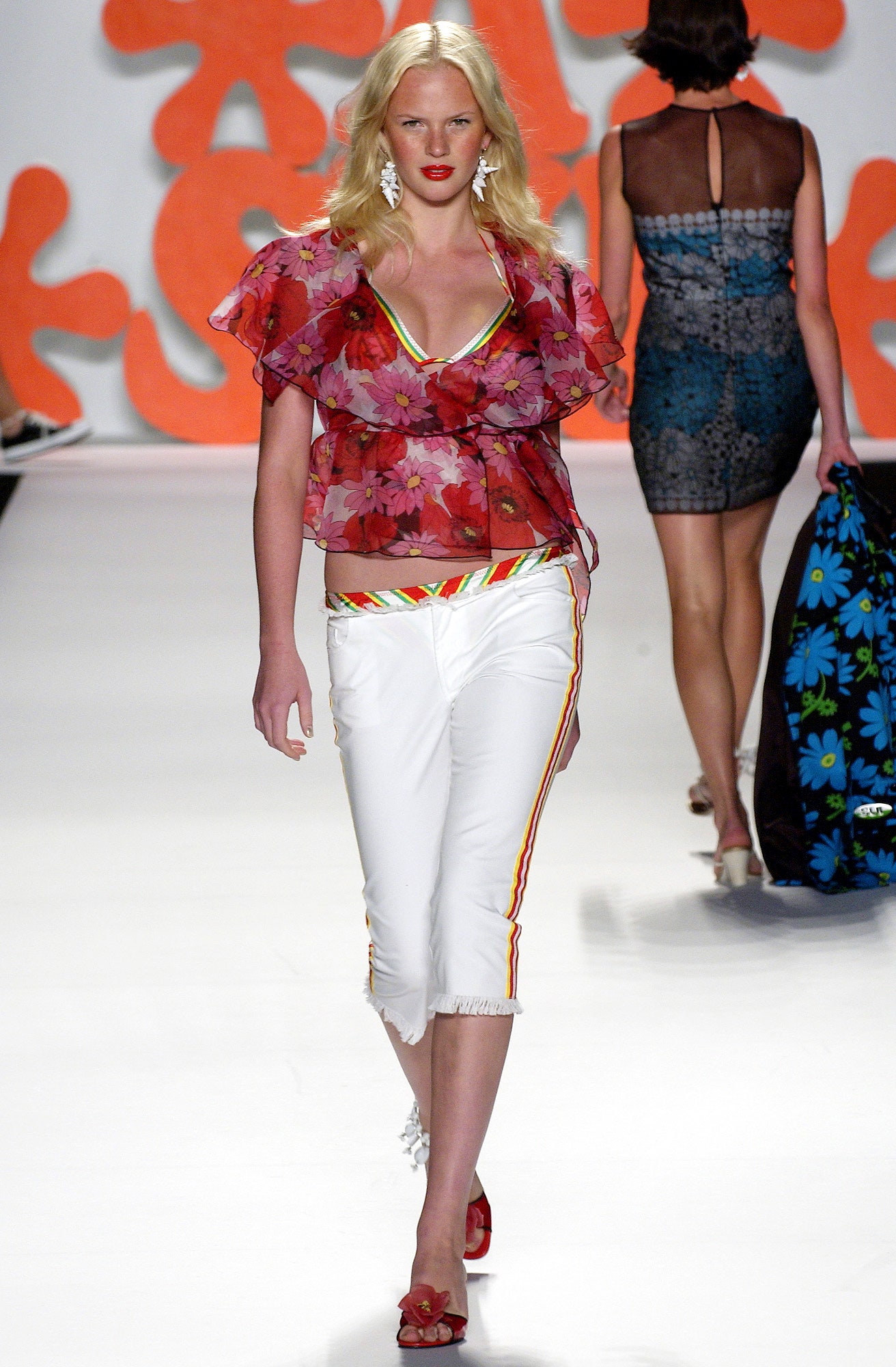 floral top with white pants