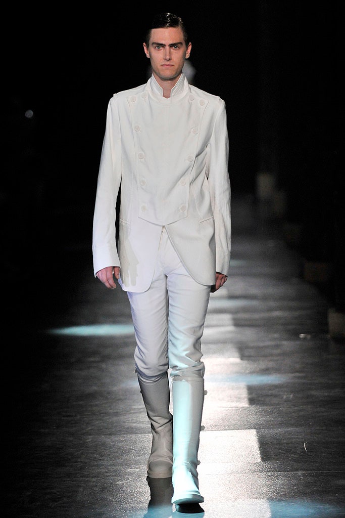 white tailored suit with boots