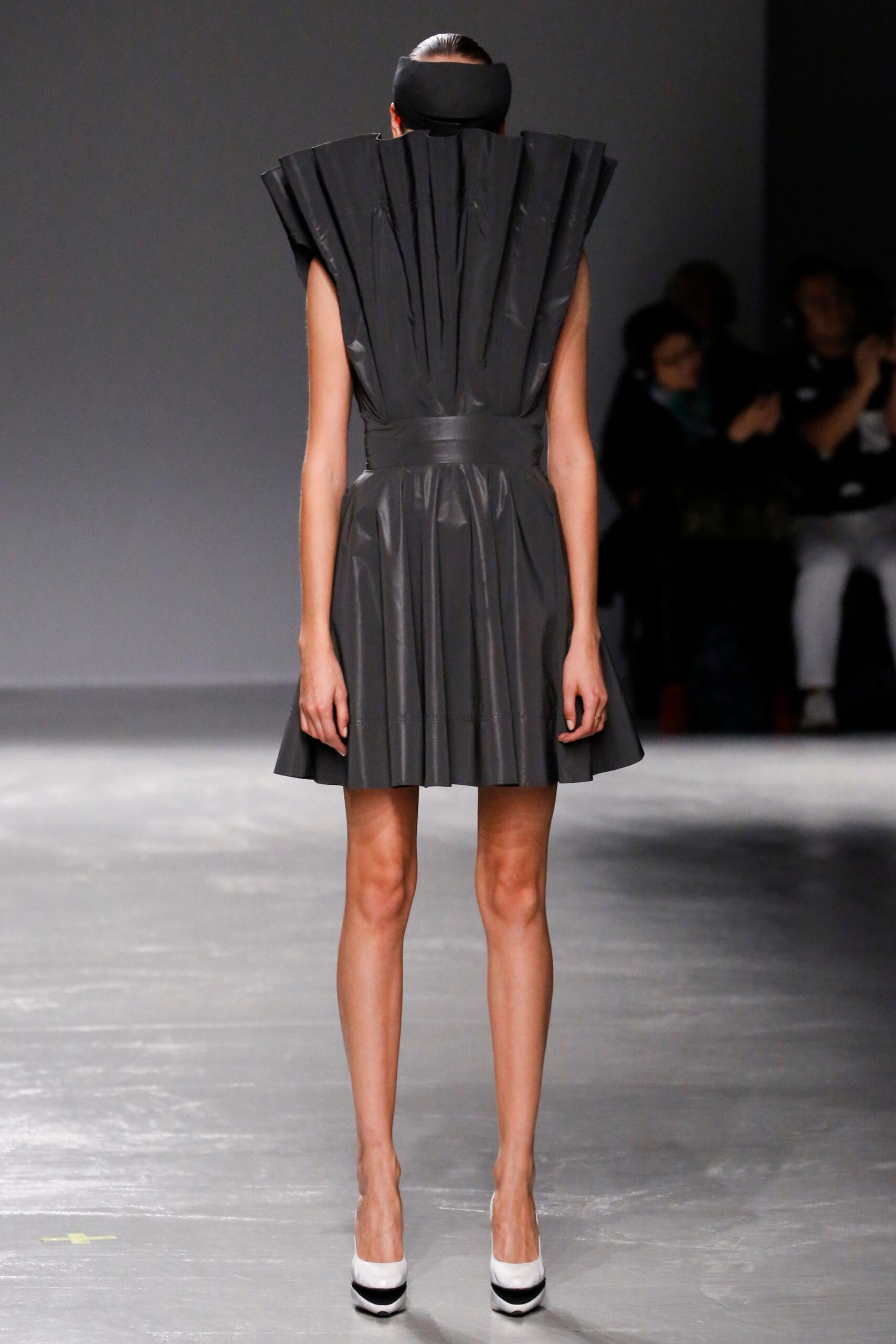 black vinyl pleated mini dress