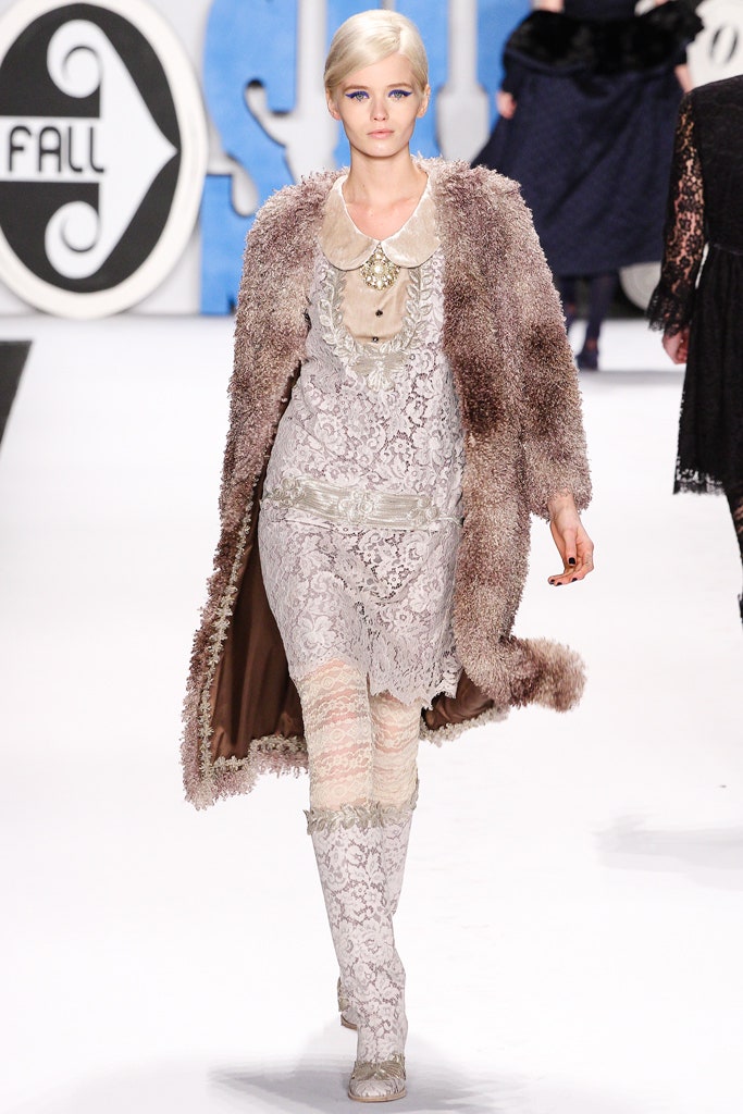 brown fur coat with lace dress