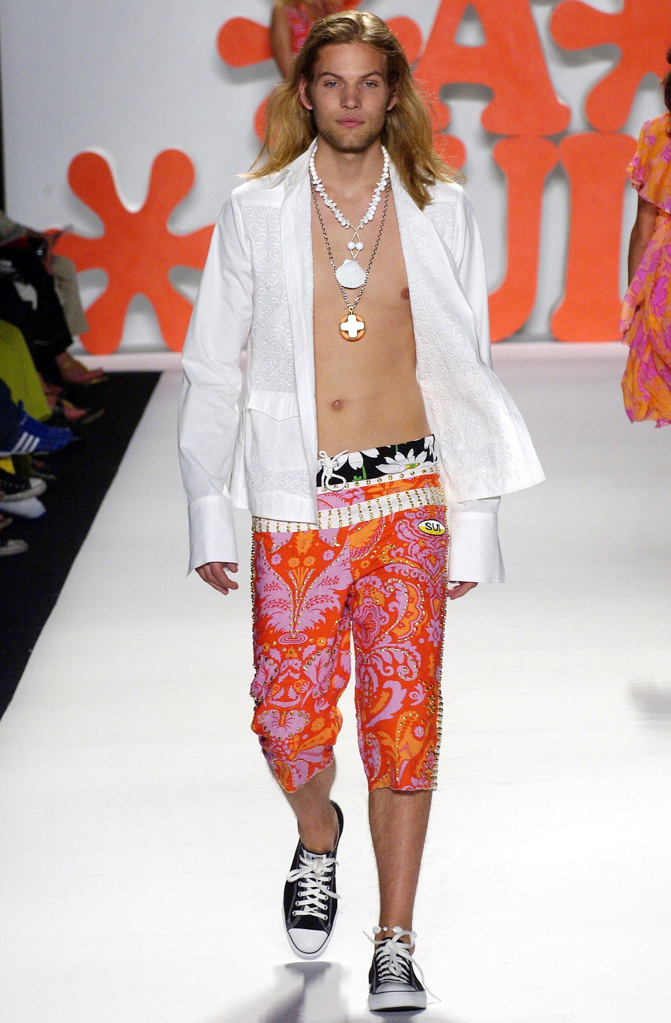 white relaxed shirt with colorful shorts