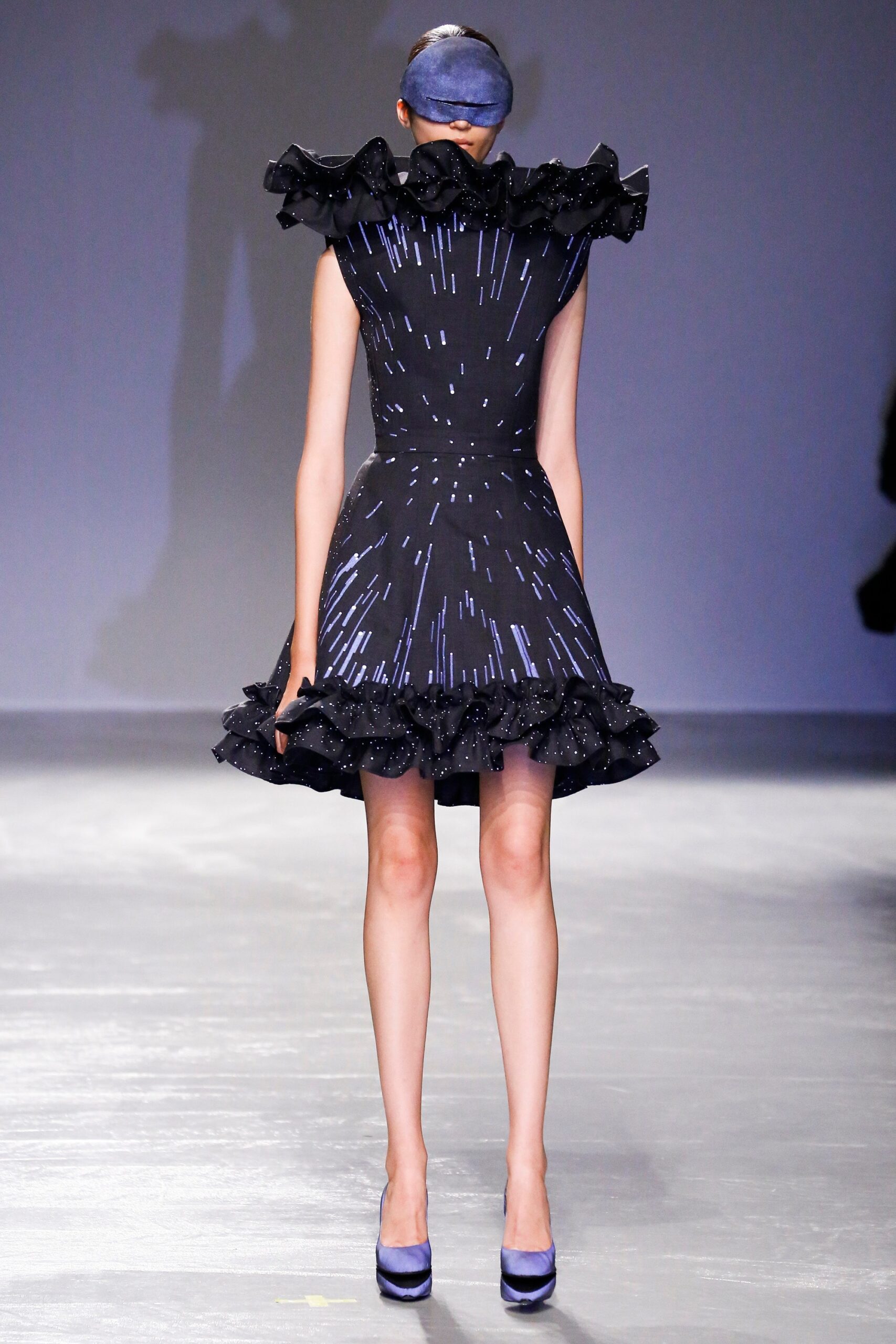 black silk sleeveless ruffled dress