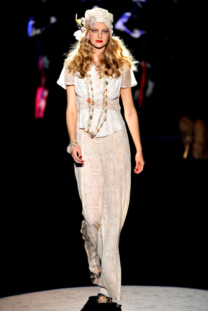 white silk top and sheer pants