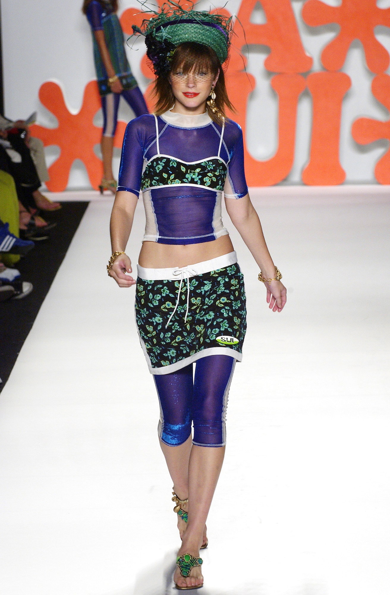 blue and green fitted top with mini skirt
