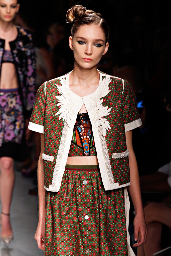 embroidered red and green top with pleated skirt