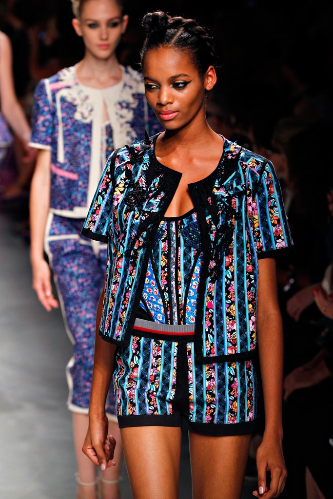 embroidered blue jacket with fitted top and shorts