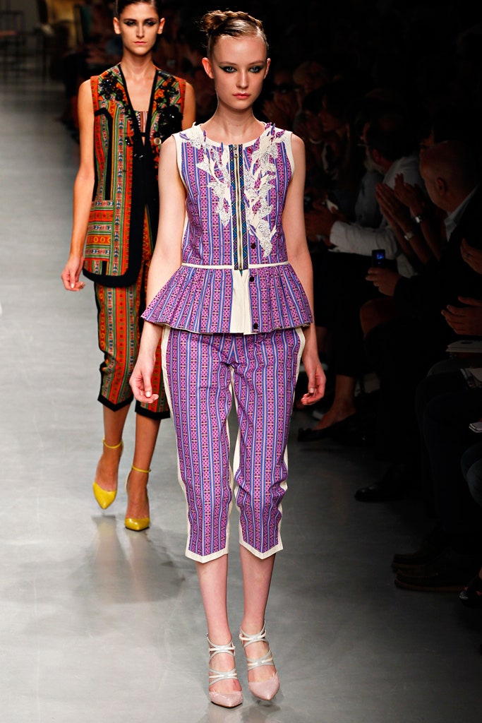 purple sleeveless collared fitted embroidered flared top