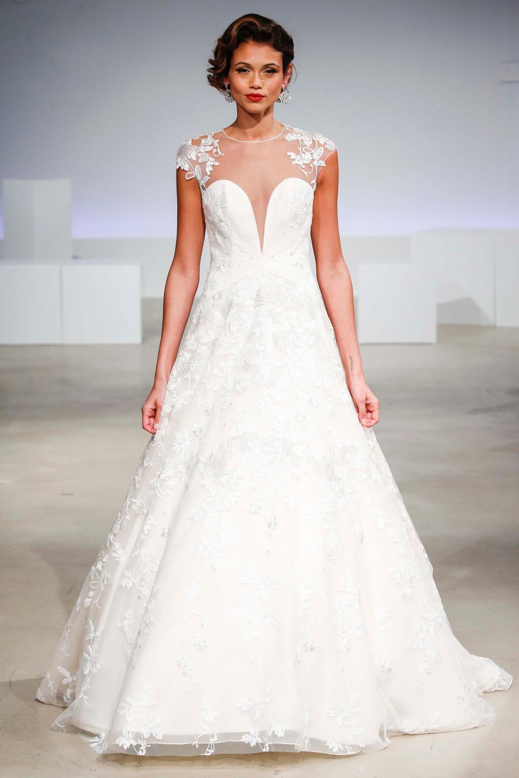 white embroidered v-neck gown
