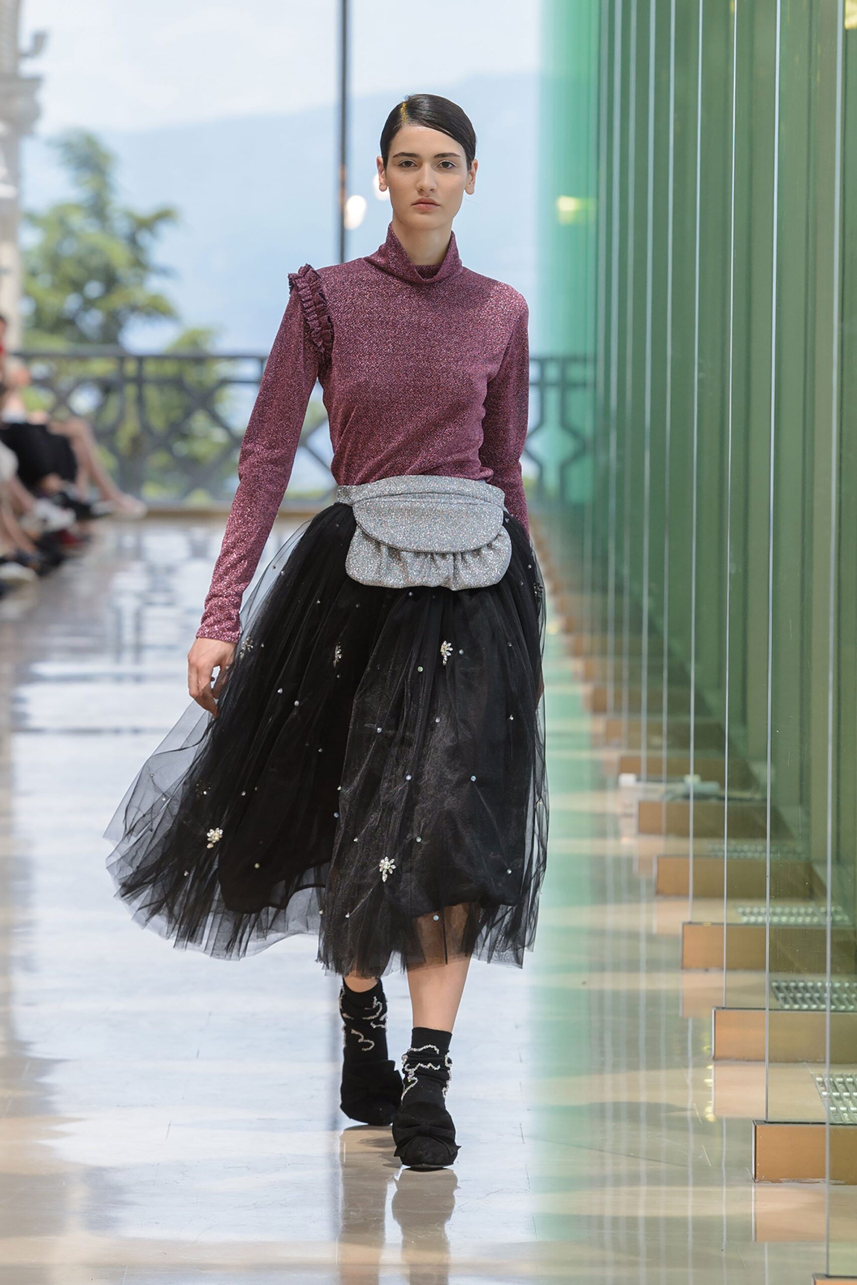 purple fitted top with black tulle skirt