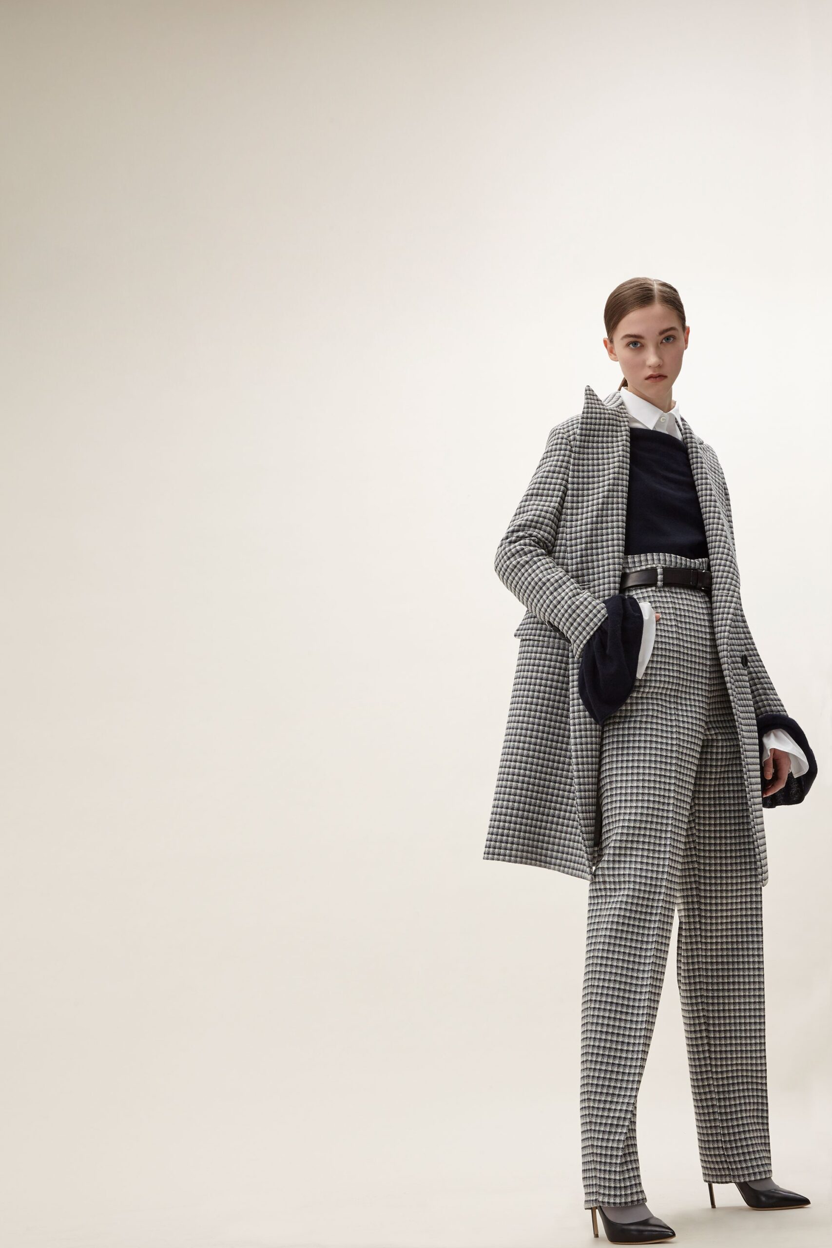 gray checked coat with tailored pants