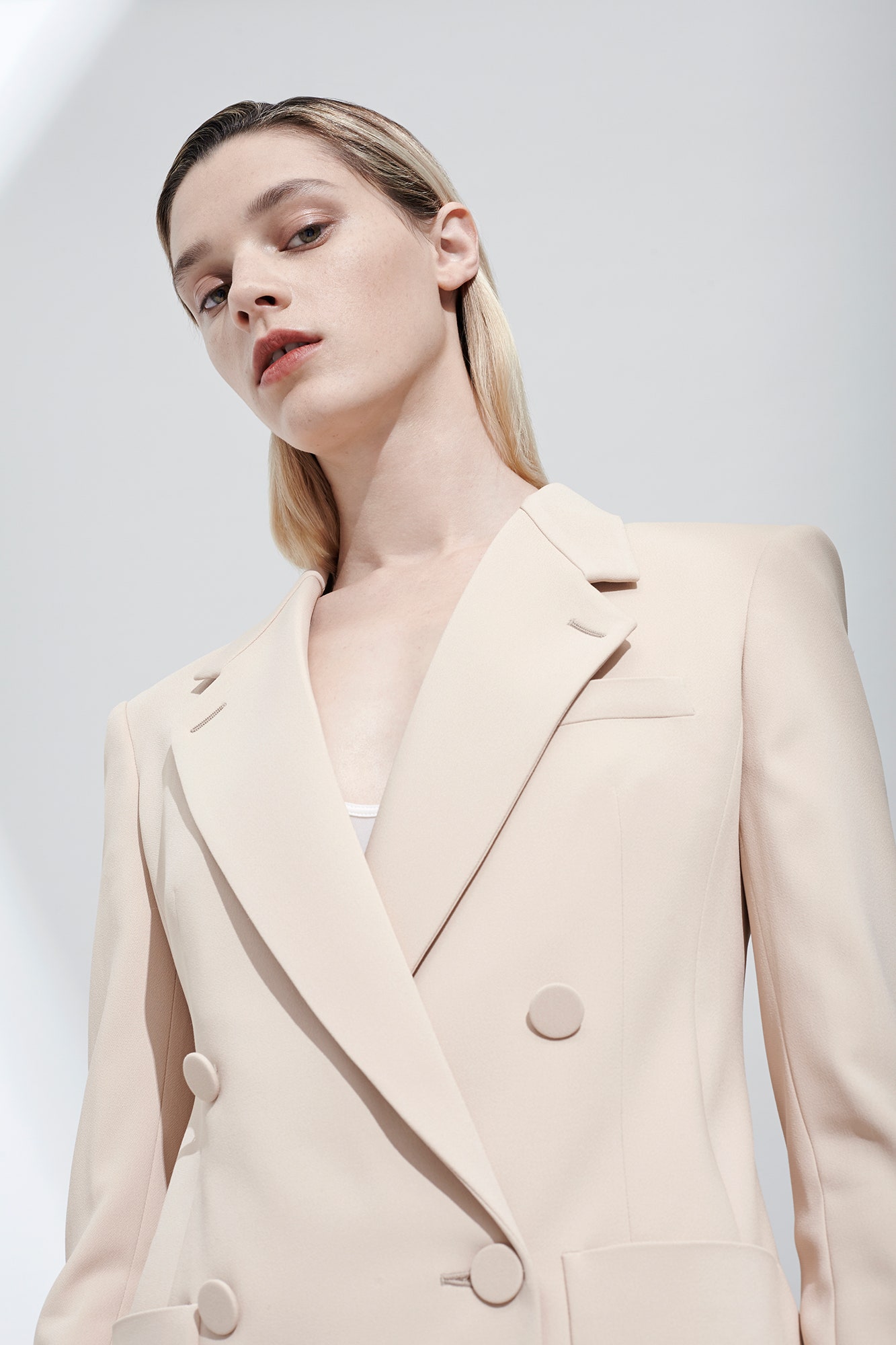 beige tailored double-breasted blazer