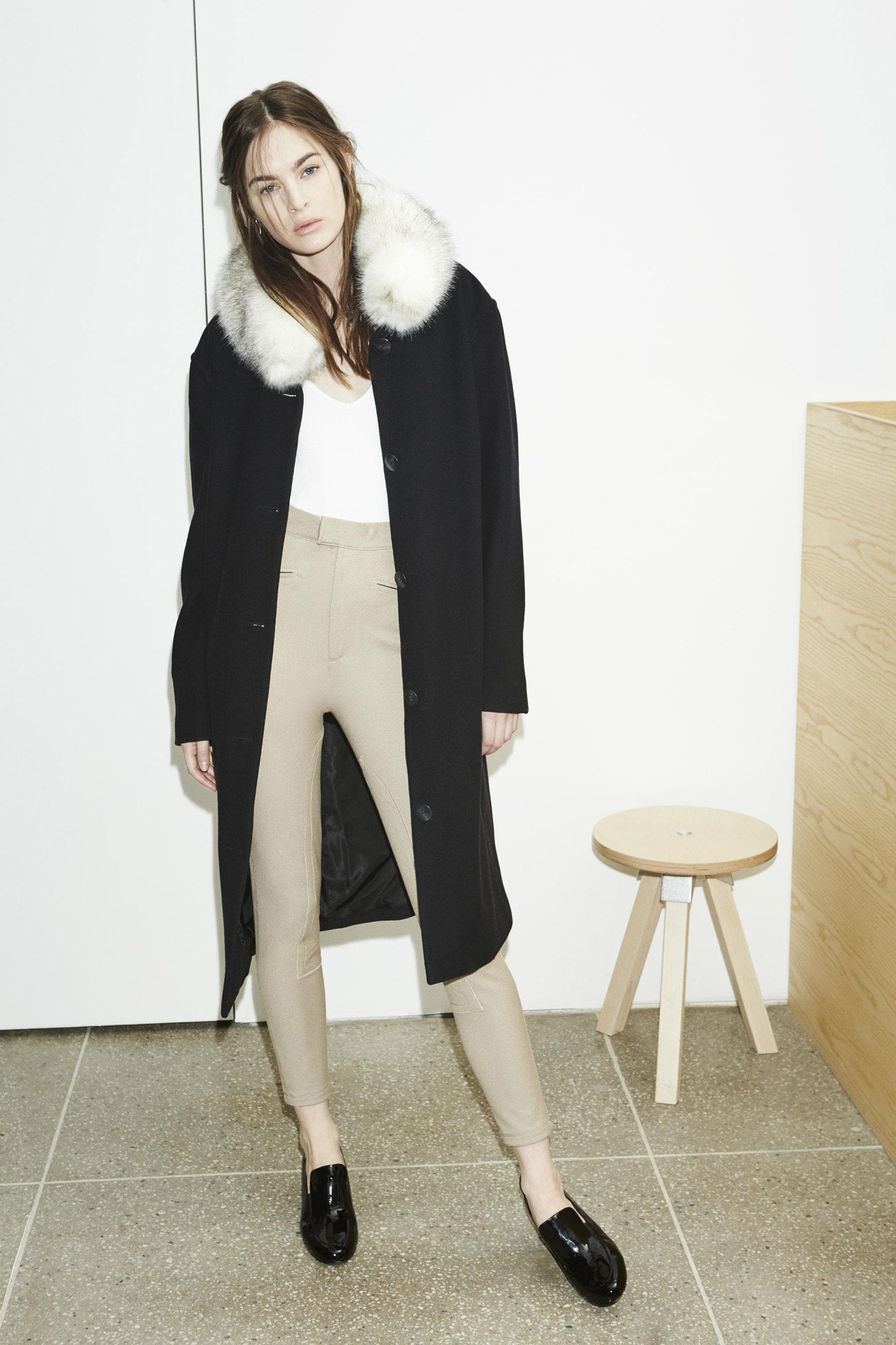 black wool coat beige pants