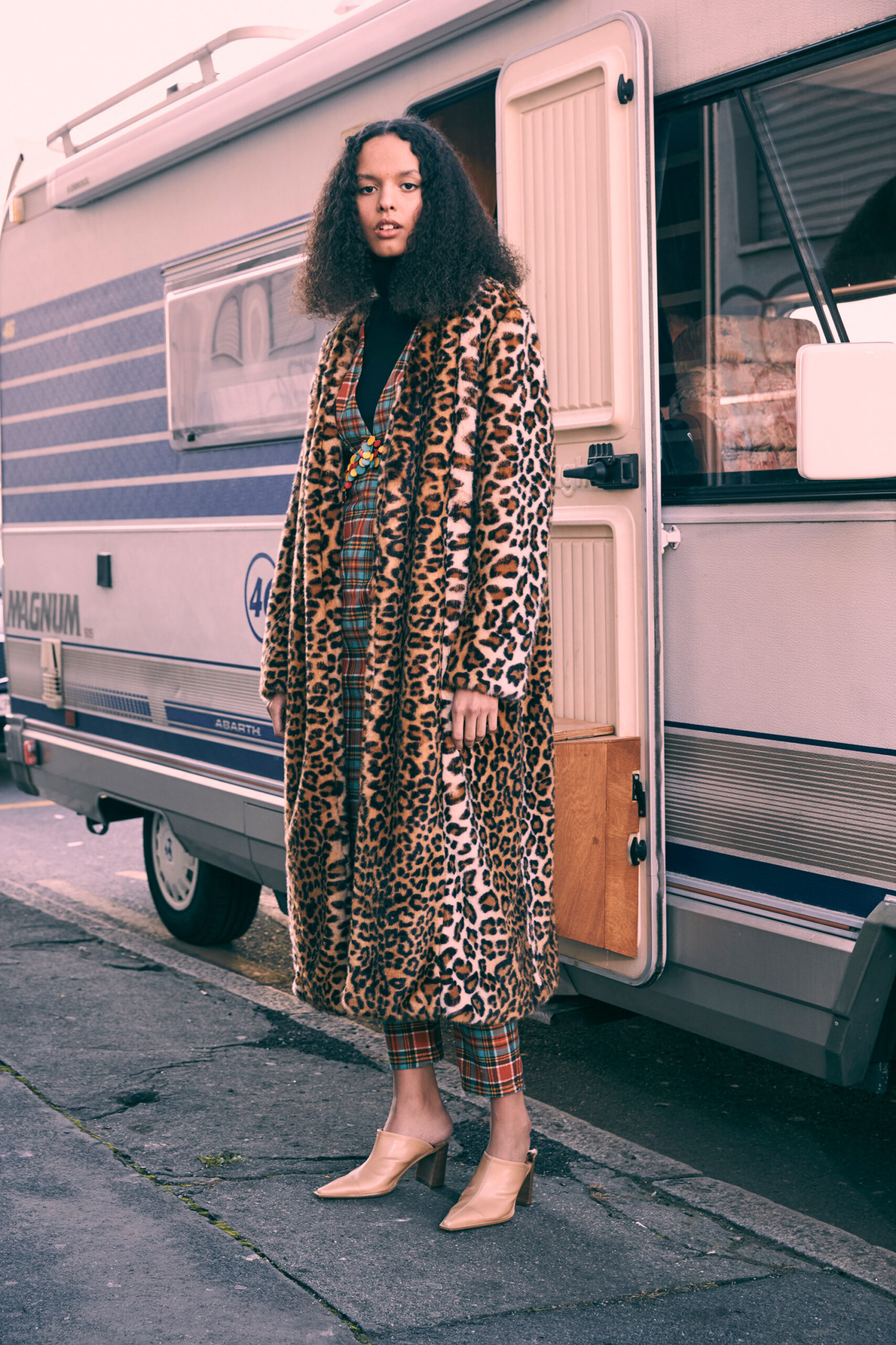 brown faux-fur coat with checked pants