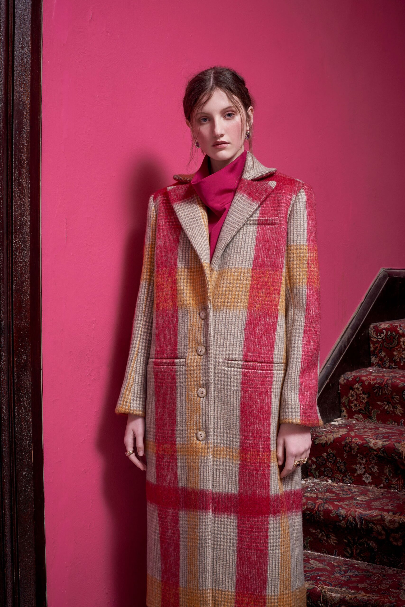 beige checked wool coat with pink scarf