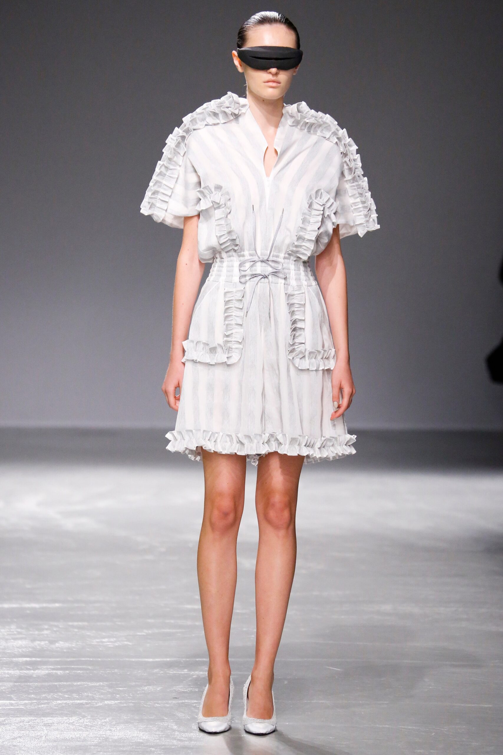 white ruffled mini dress
