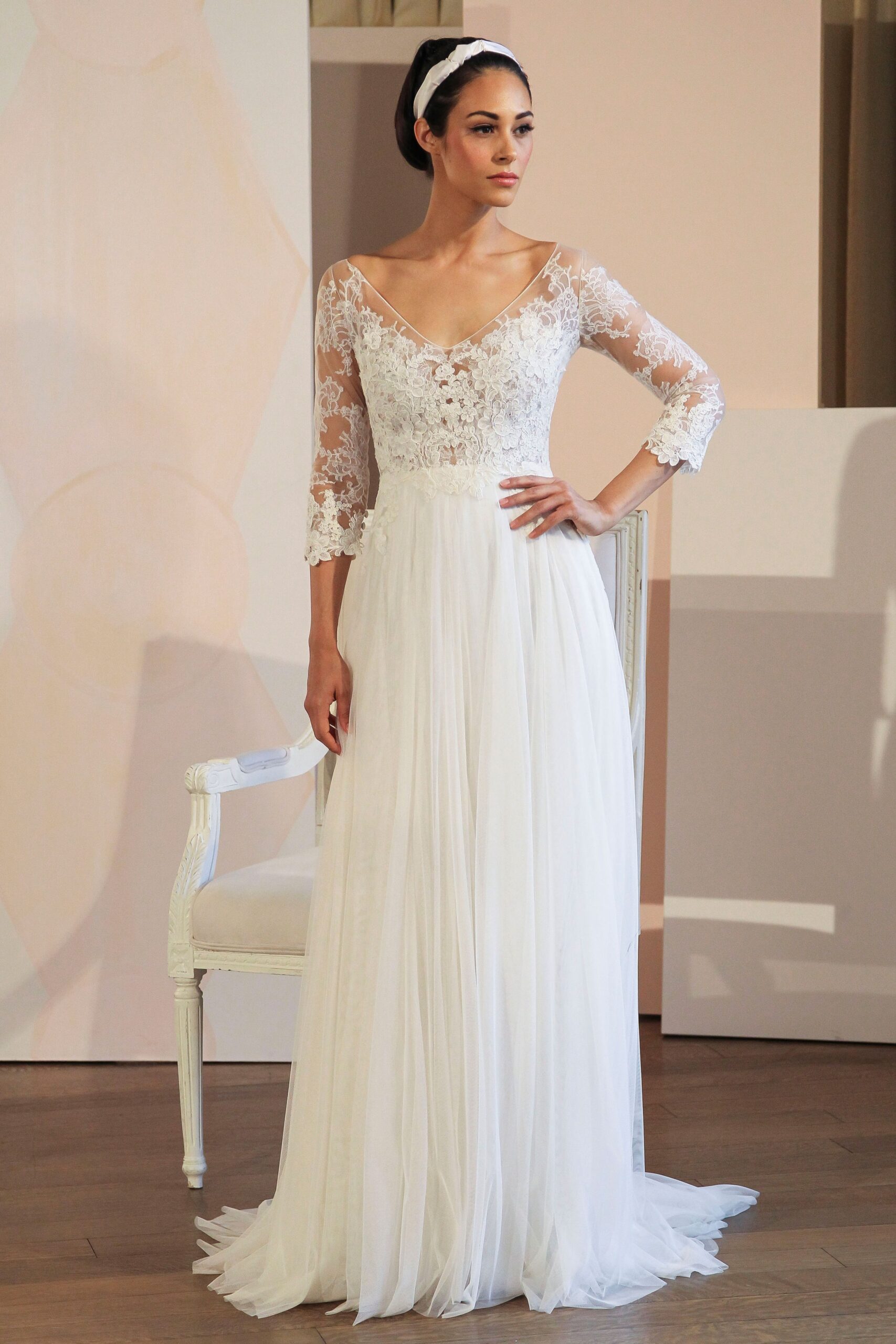 white lace long-sleeve gown