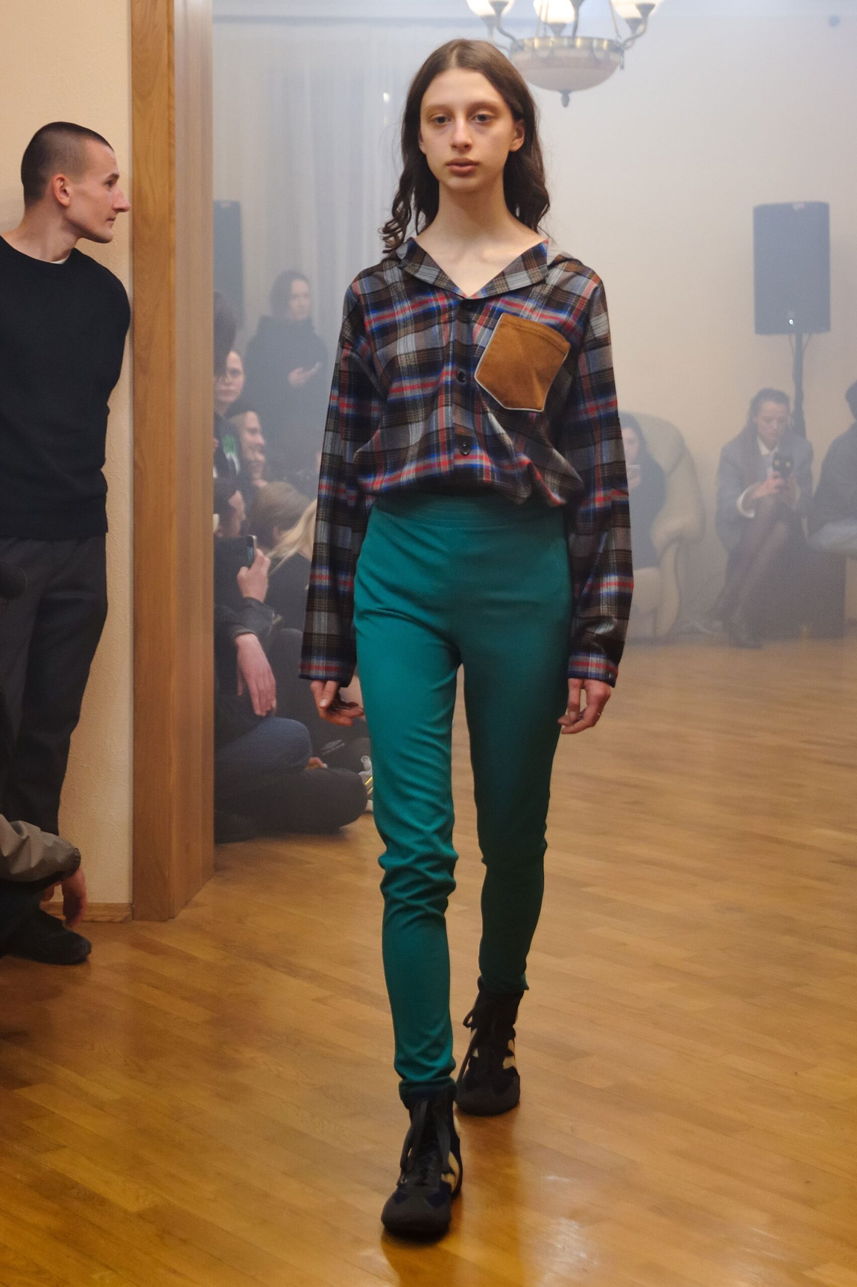 checked shirt and green pants