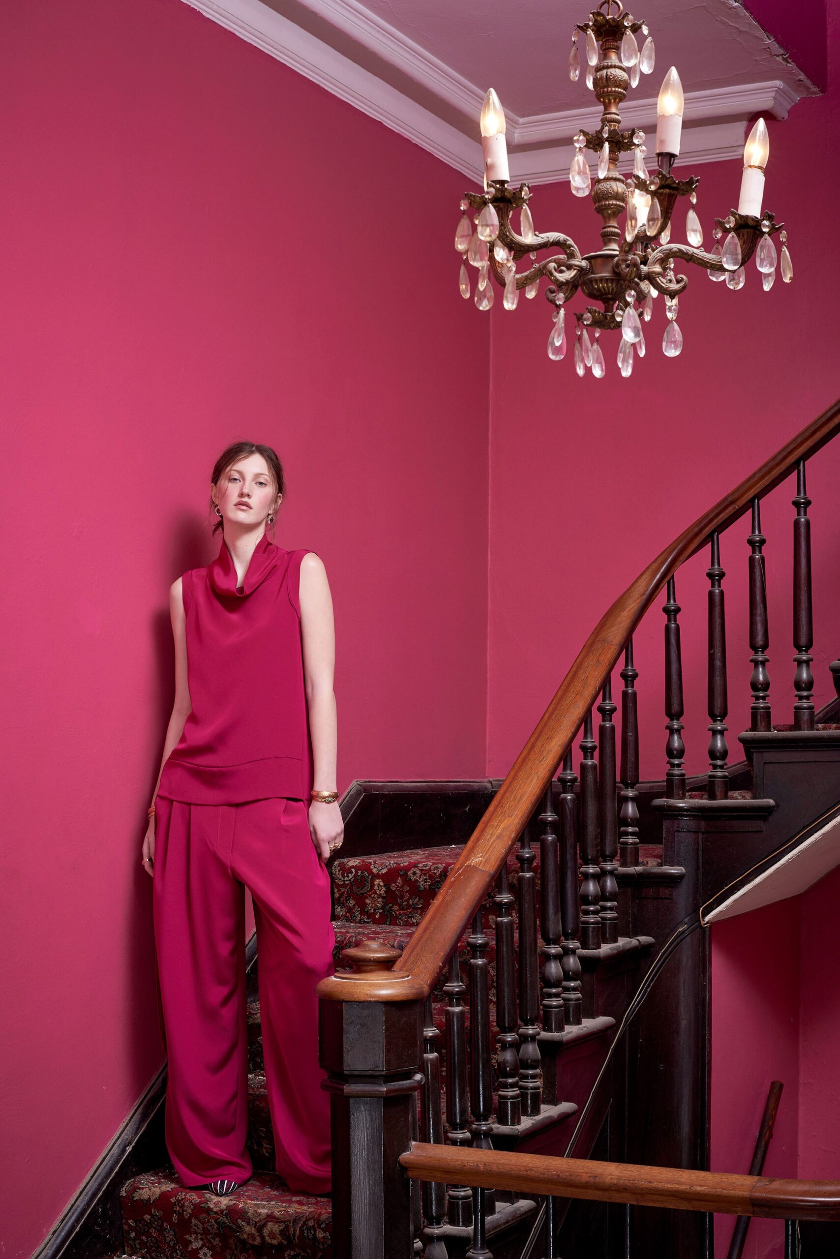 pink sleeveless high-neck relaxed draped top