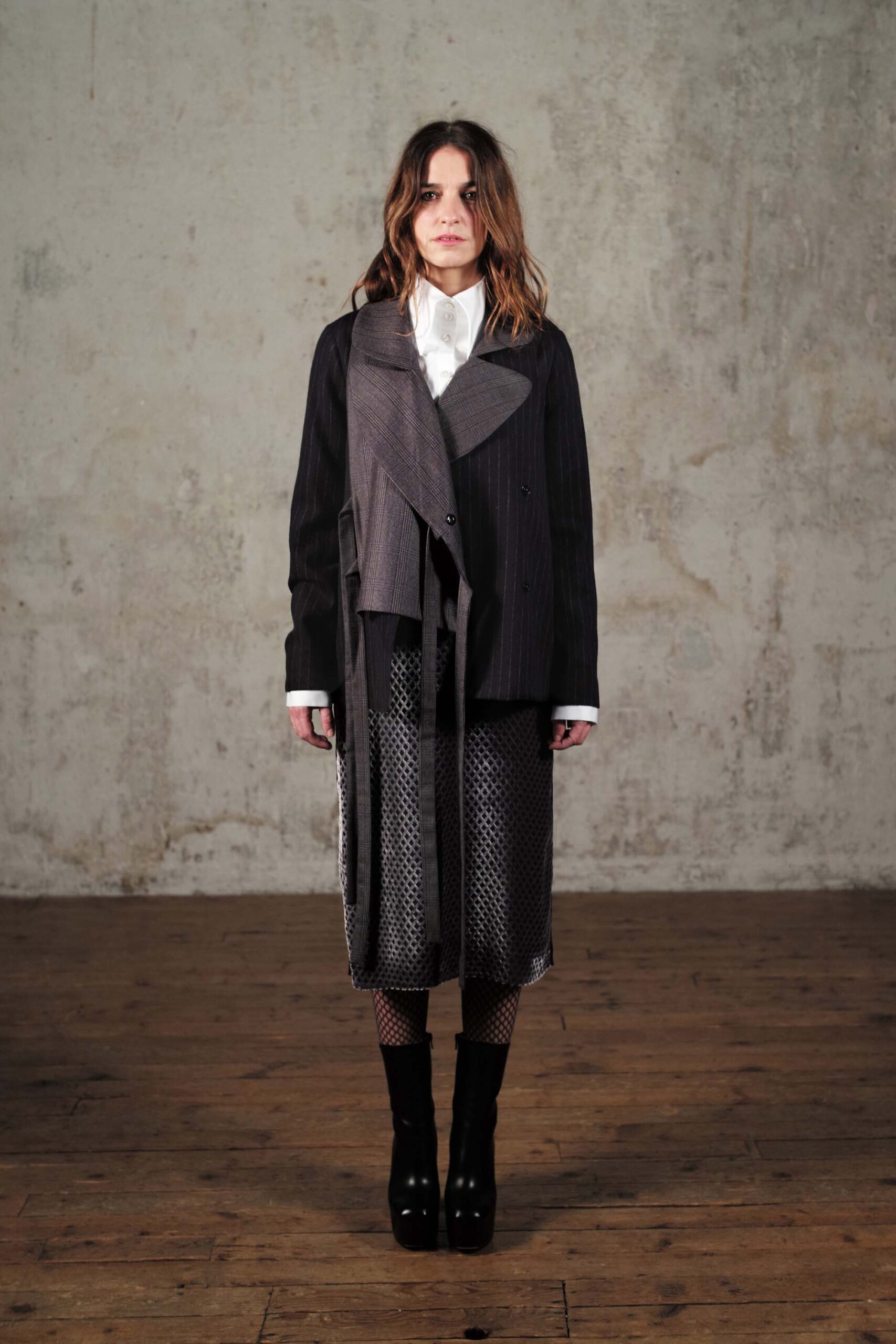black cotton long-sleeve collared structured buttoned layered jacket