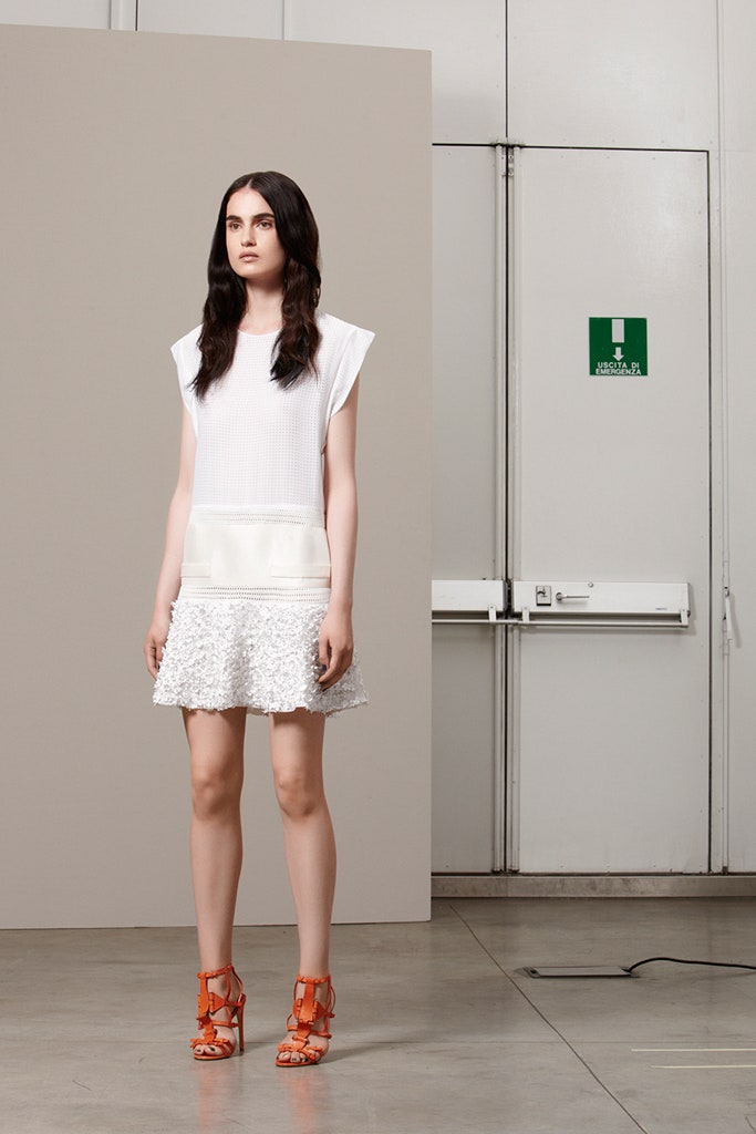 white mini dress with orange shoes