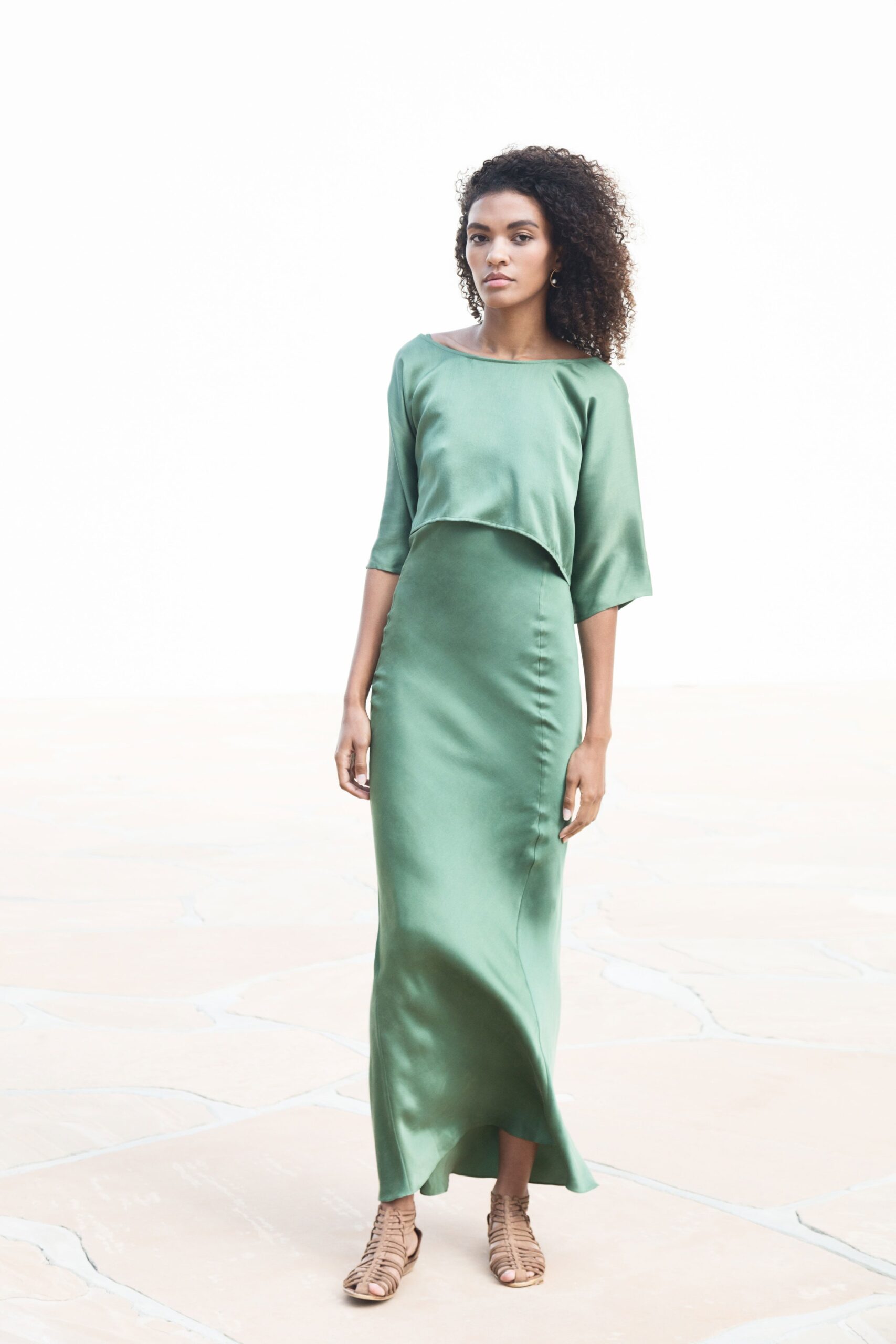 green silk sleeveless high-neck fitted straight-leg flowing dress