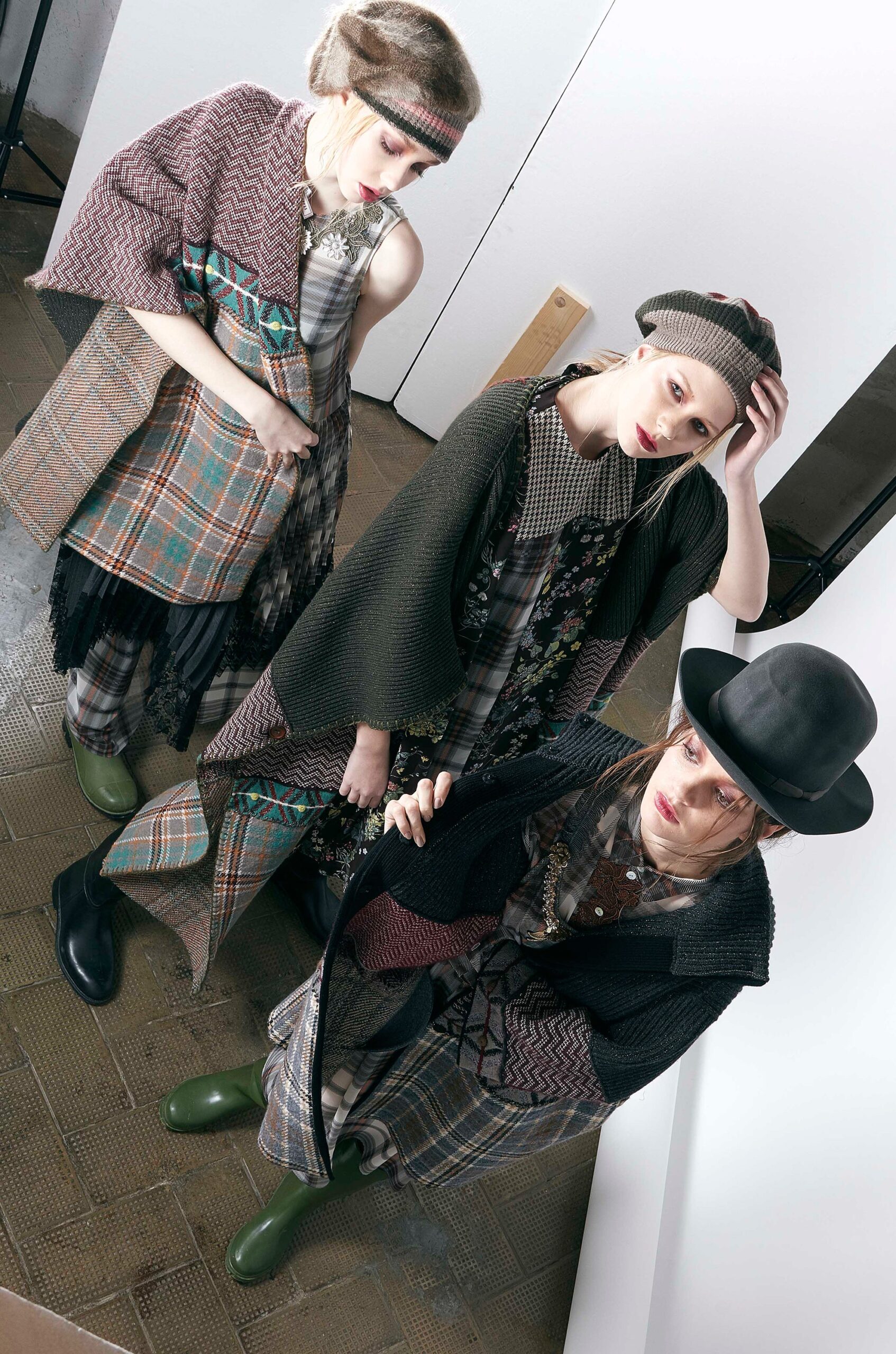 layered brown cape and black dress