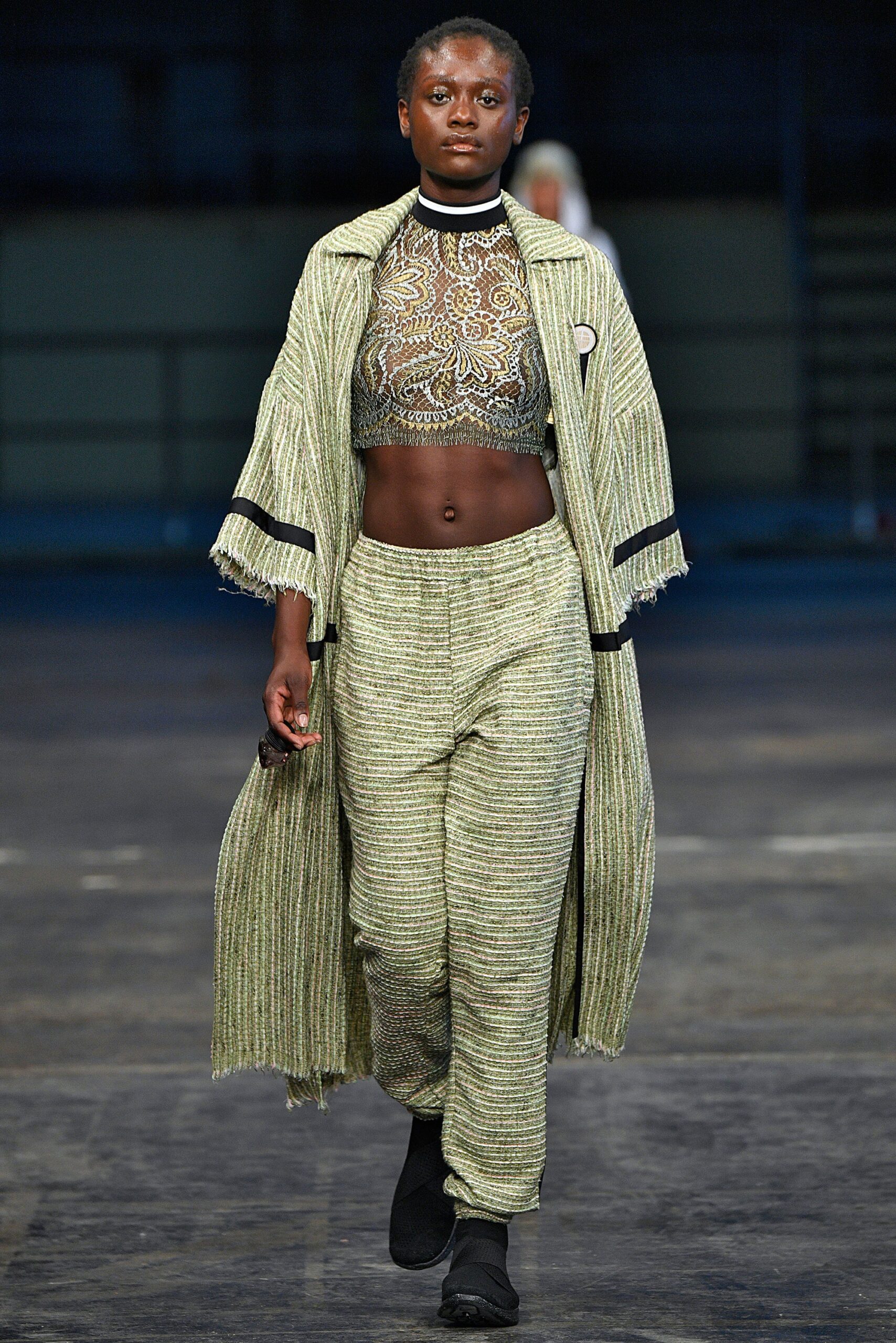 green coat black lace top tailored pants