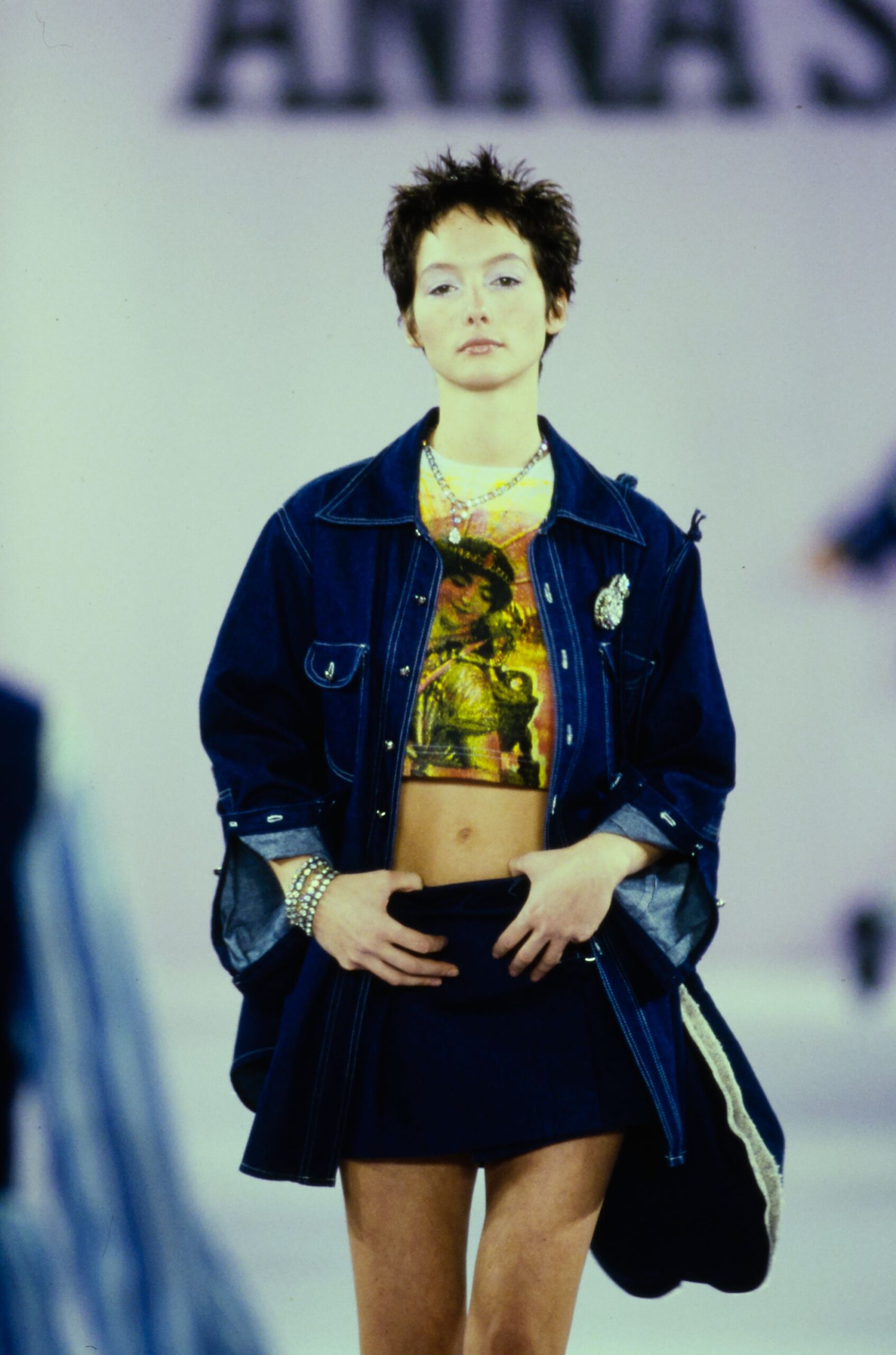 blue denim jacket with yellow top
