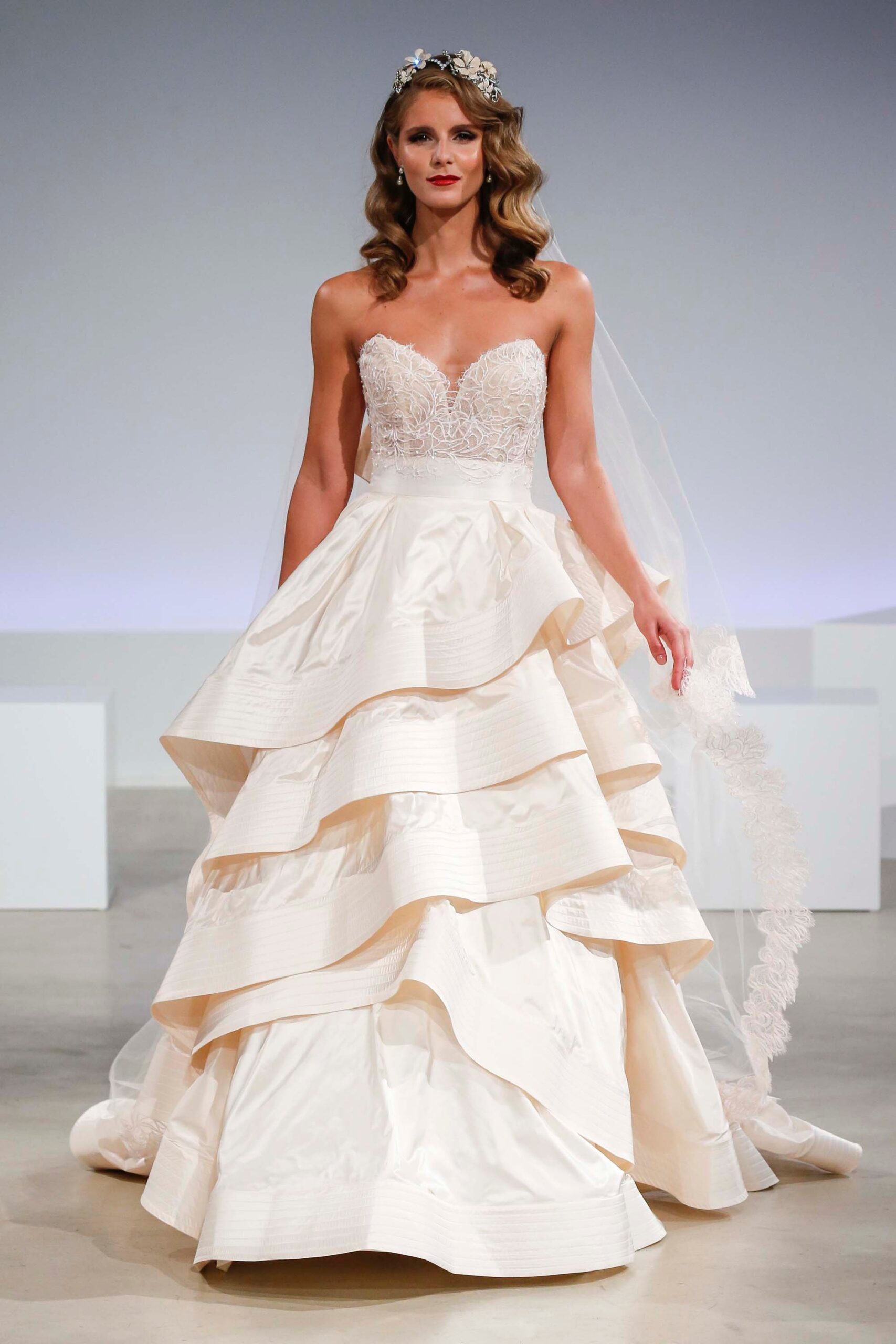 ivory silk tiered gown with veil