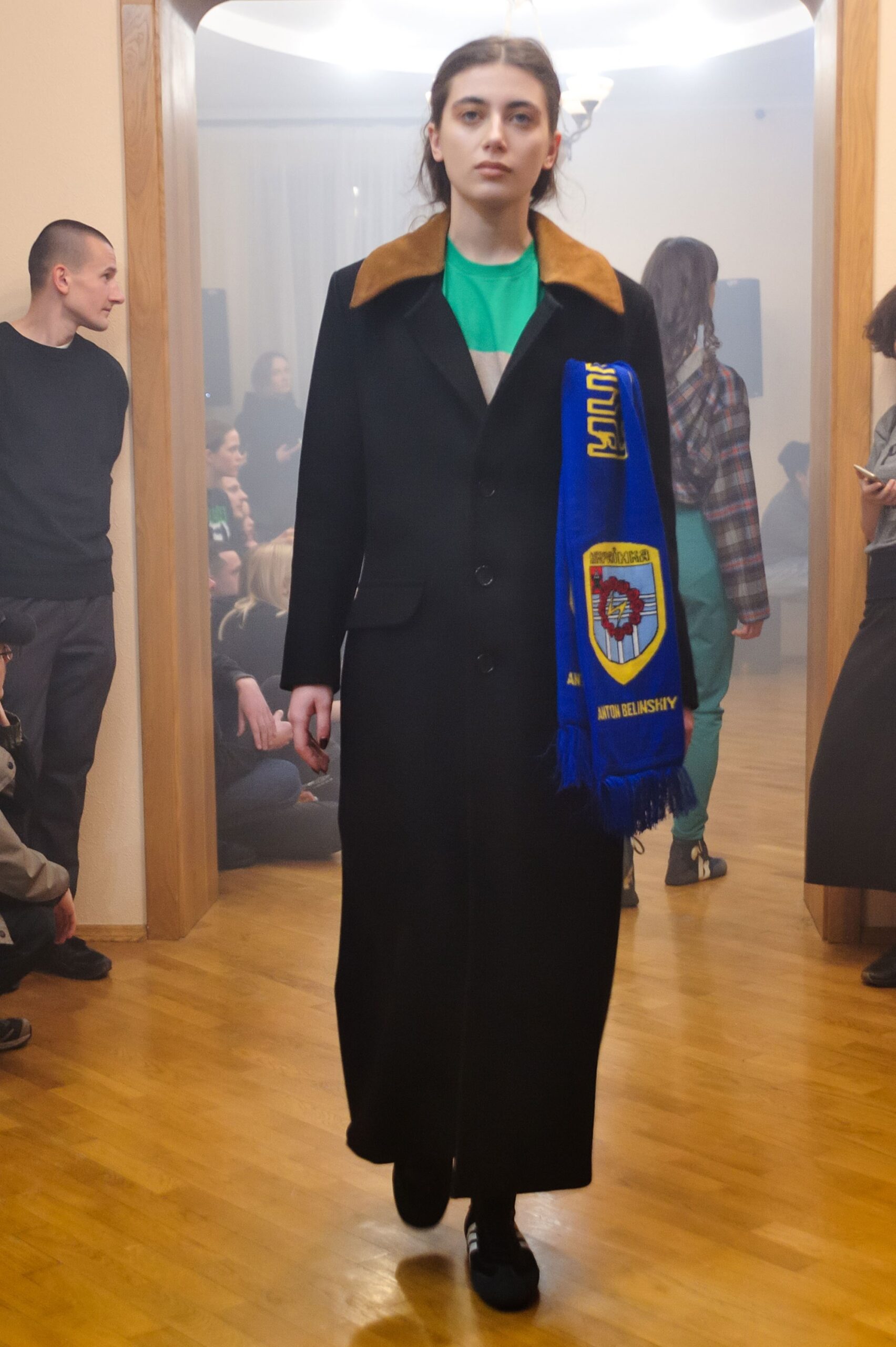 black wool long-sleeve collared fitted buttoned maxi coat