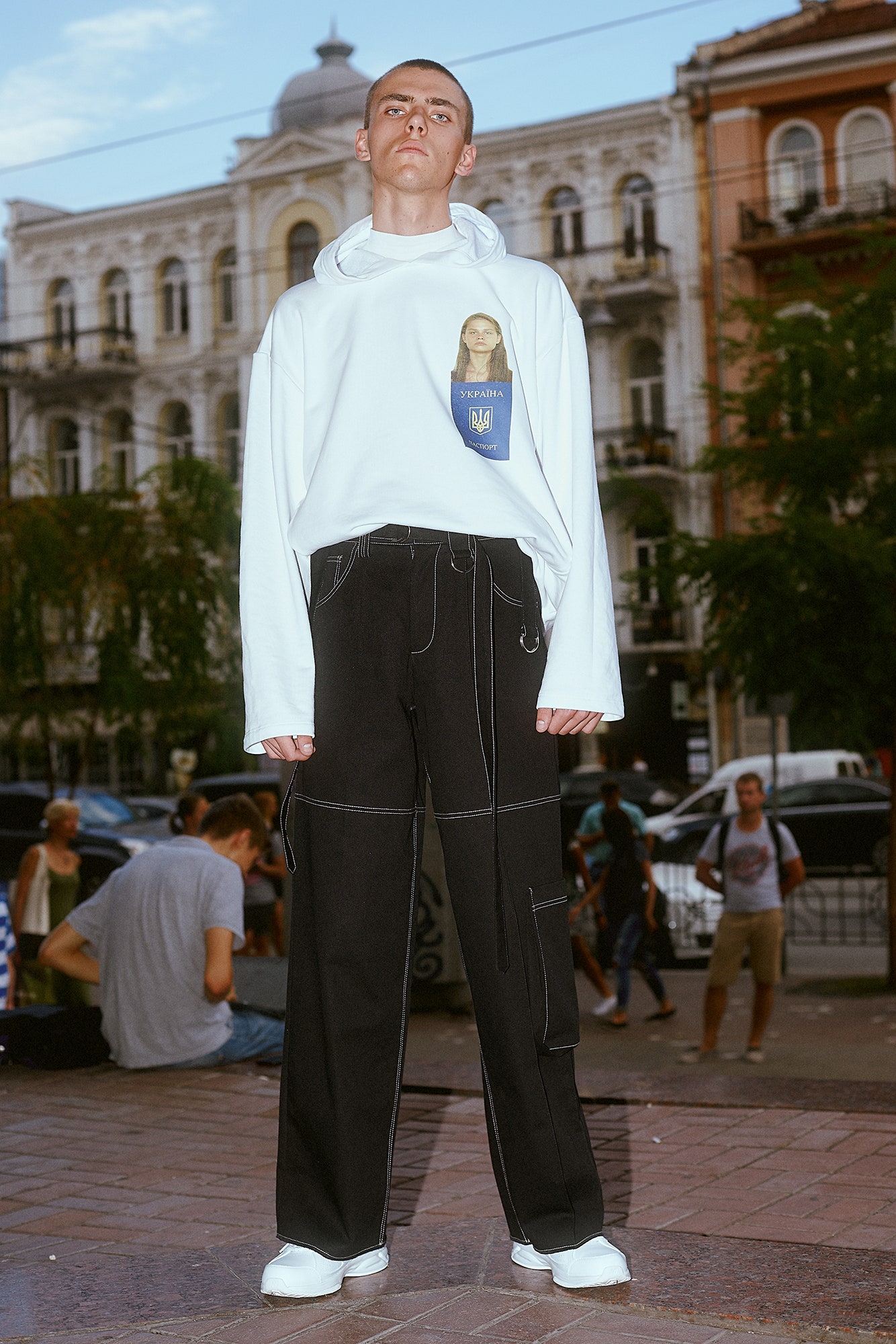 white relaxed hoodie and black pants