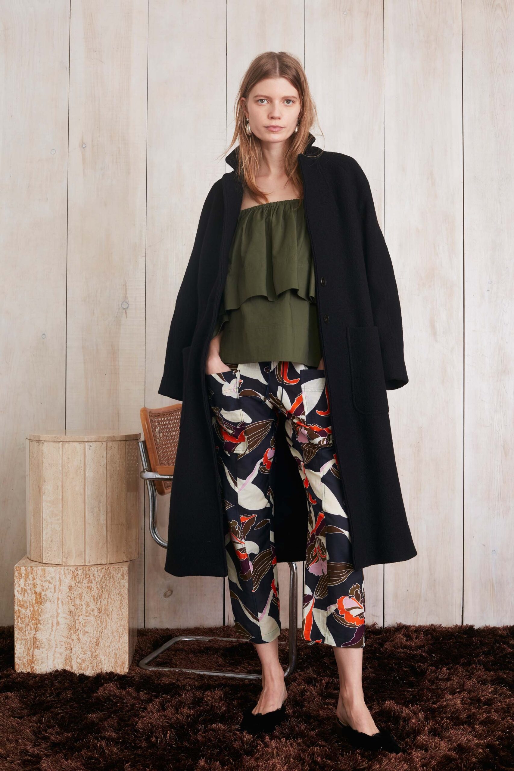 black oversized coat with green top