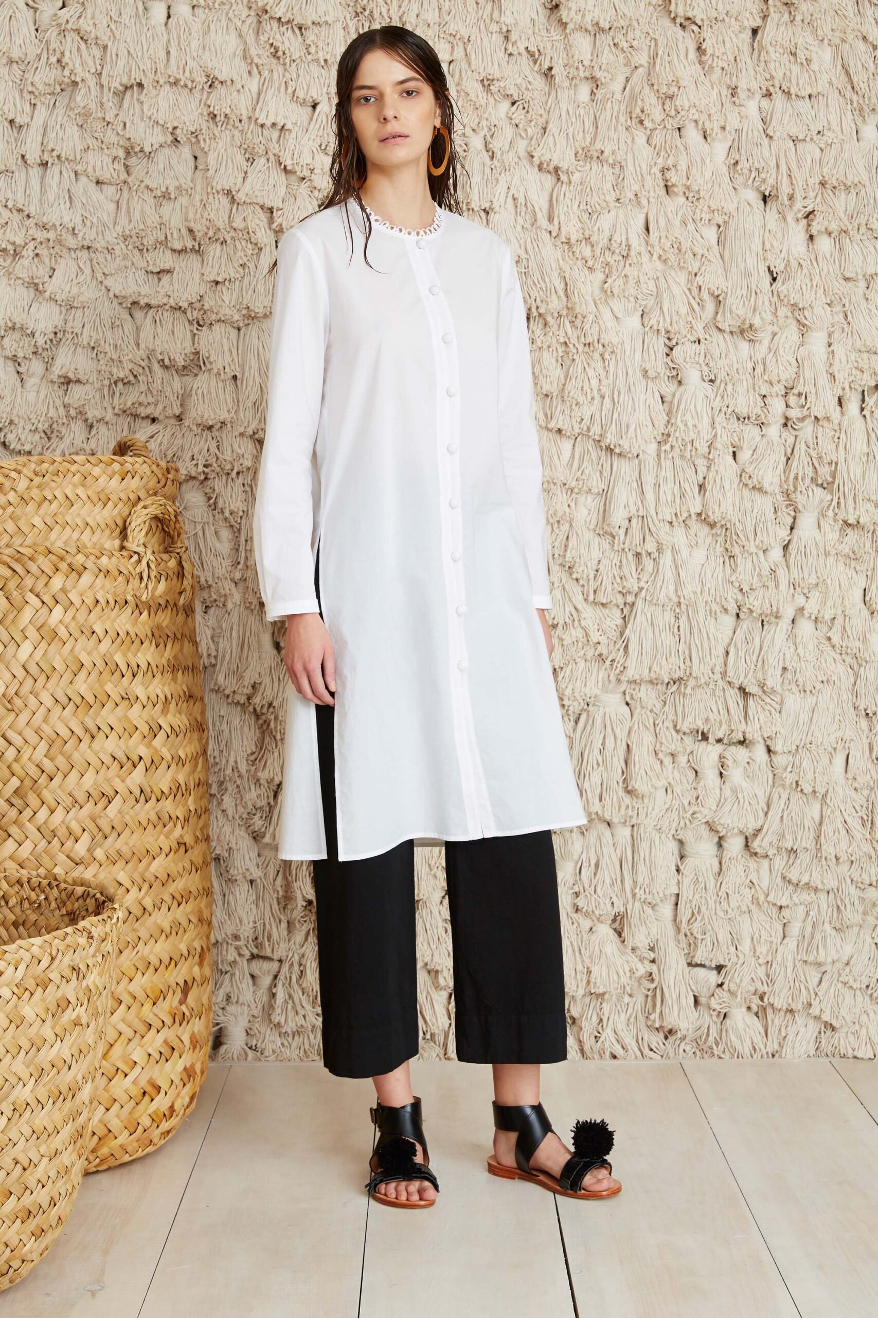 white shirt-dress with black pants
