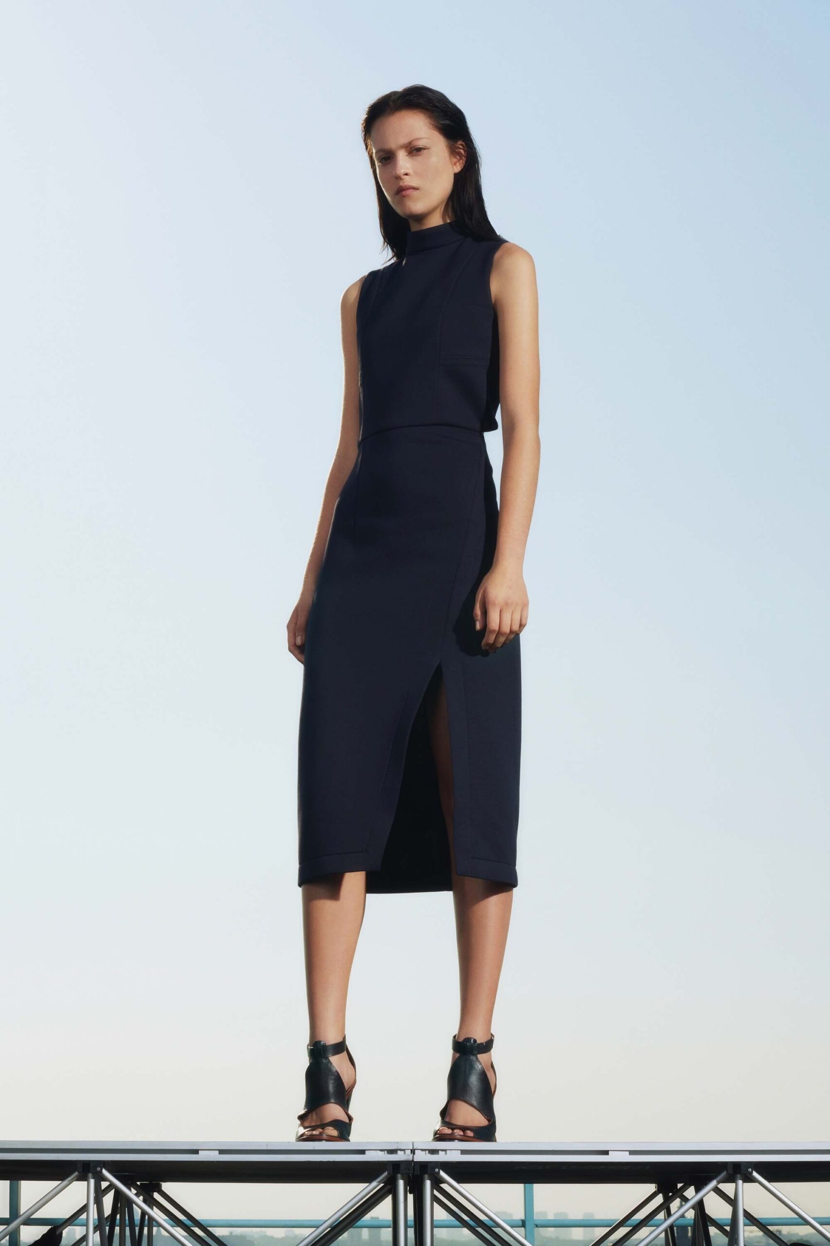 black fitted midi dress