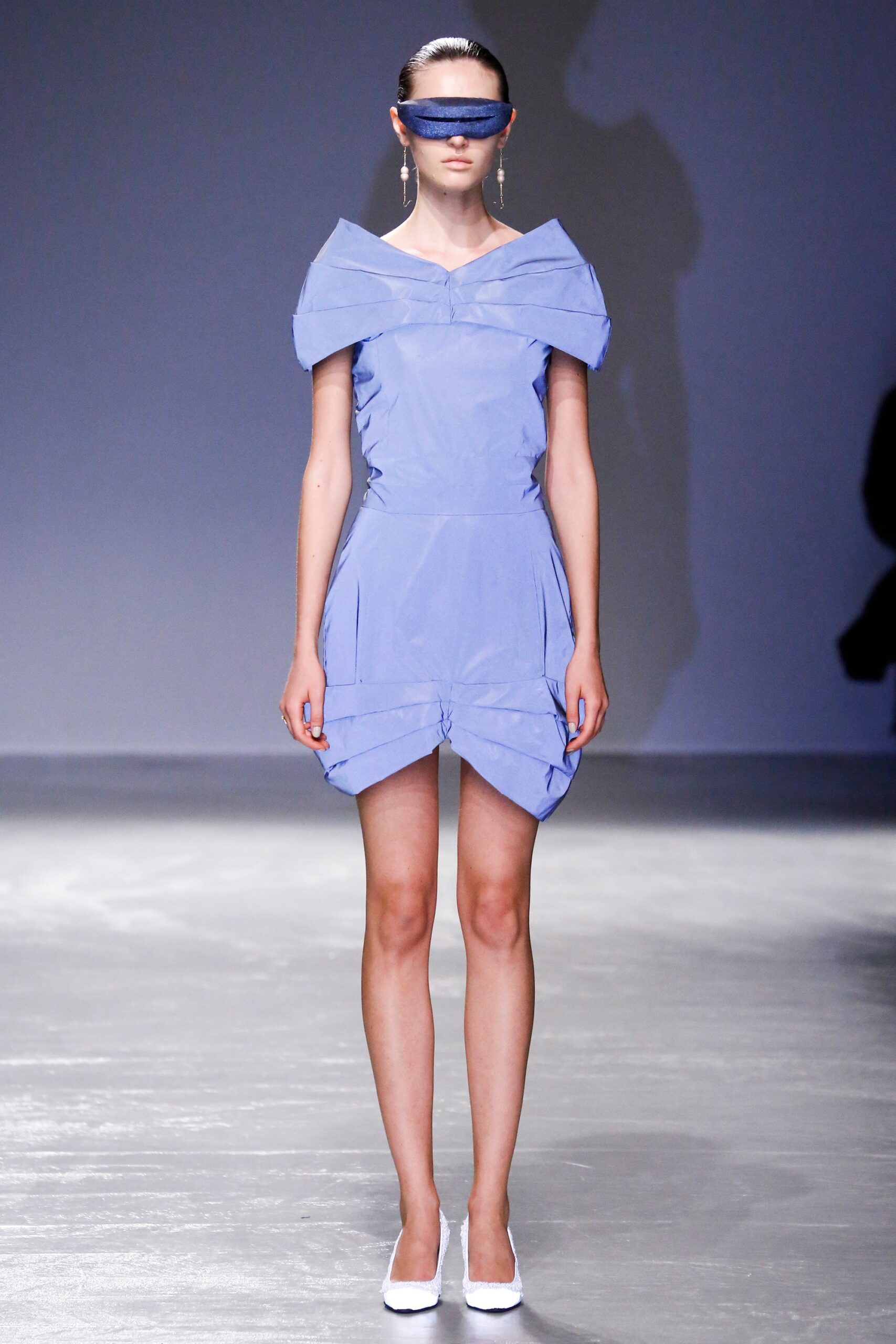 fitted blue sleeveless dress