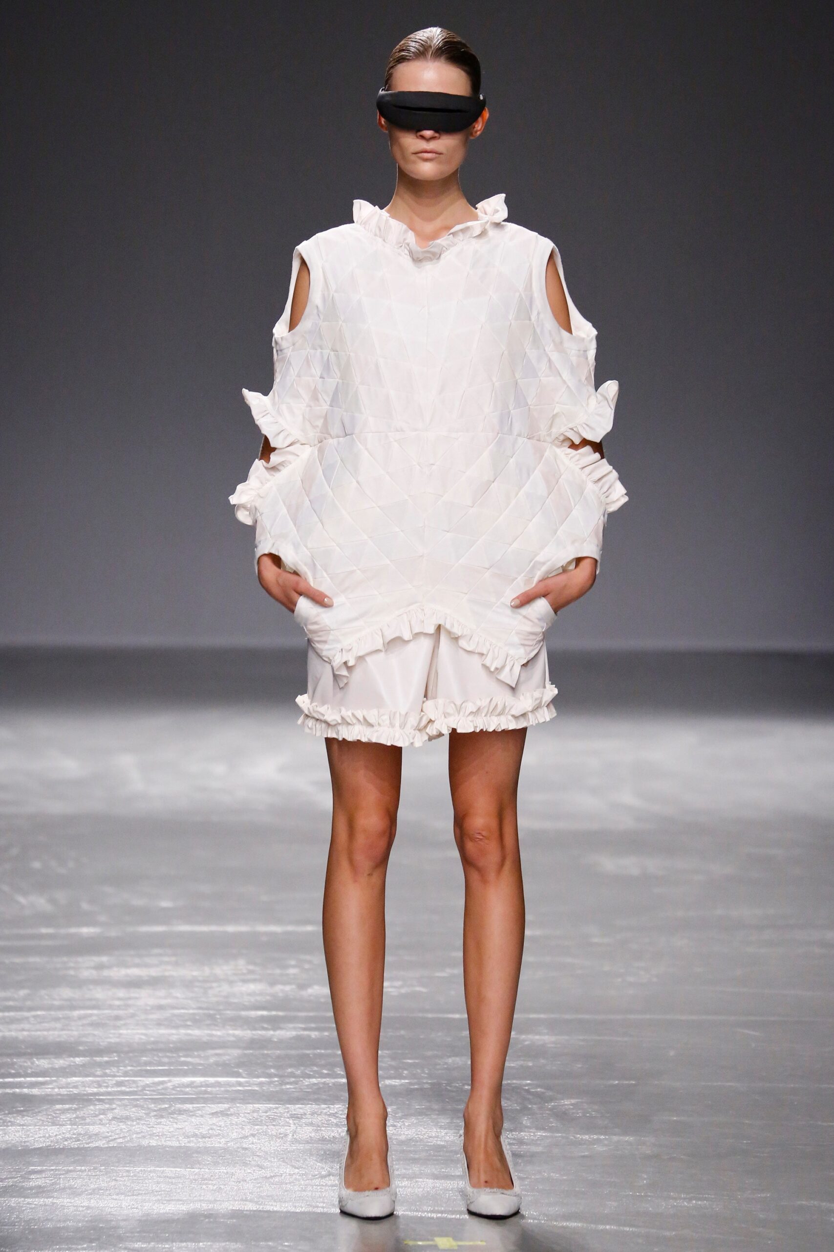 white ruffled top and shorts