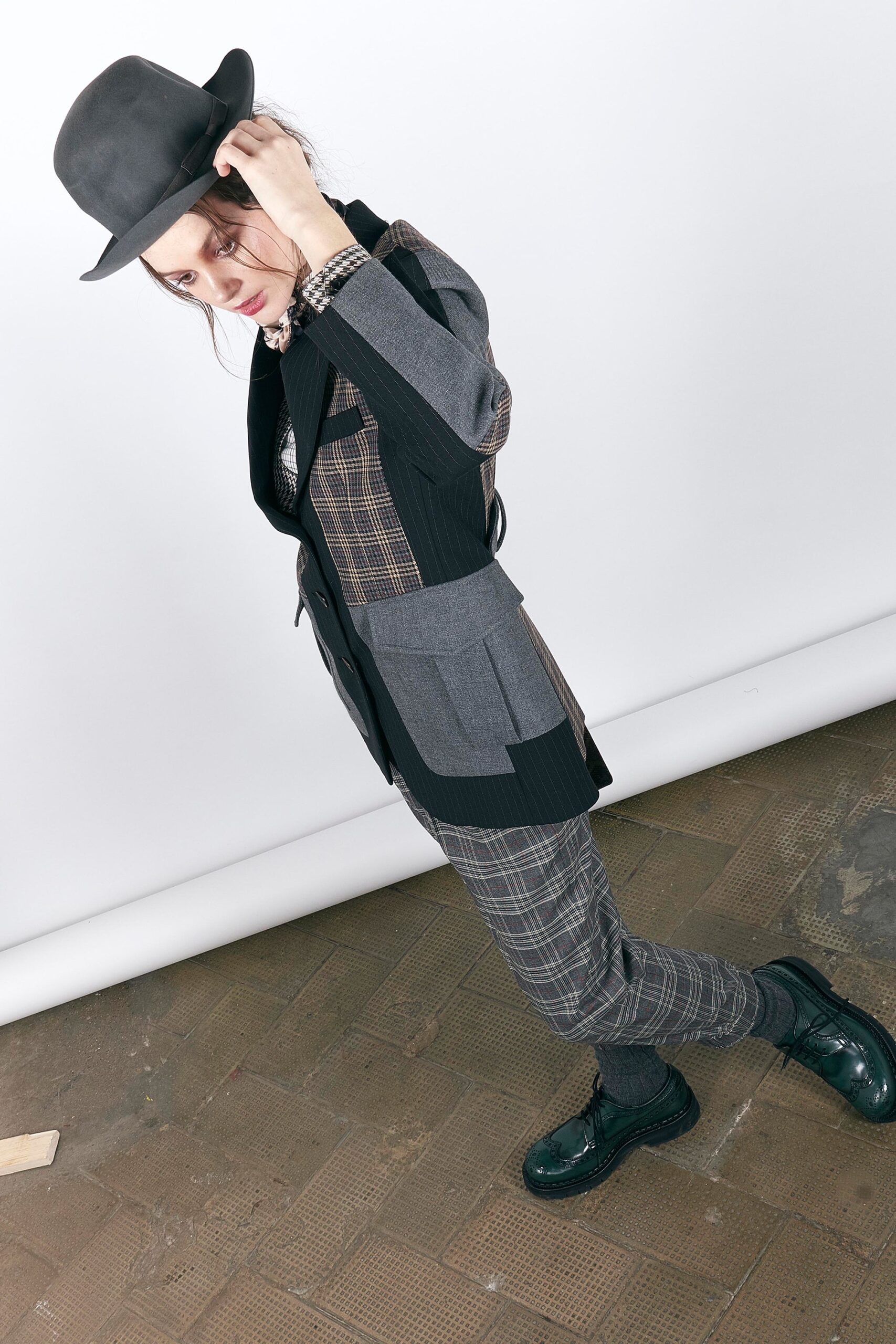 gray tailored blazer with checked pants