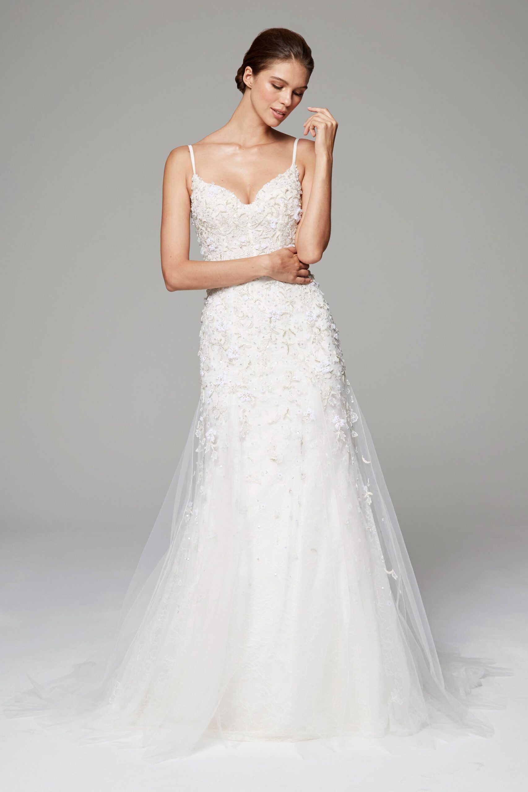 white embellished sleeveless gown
