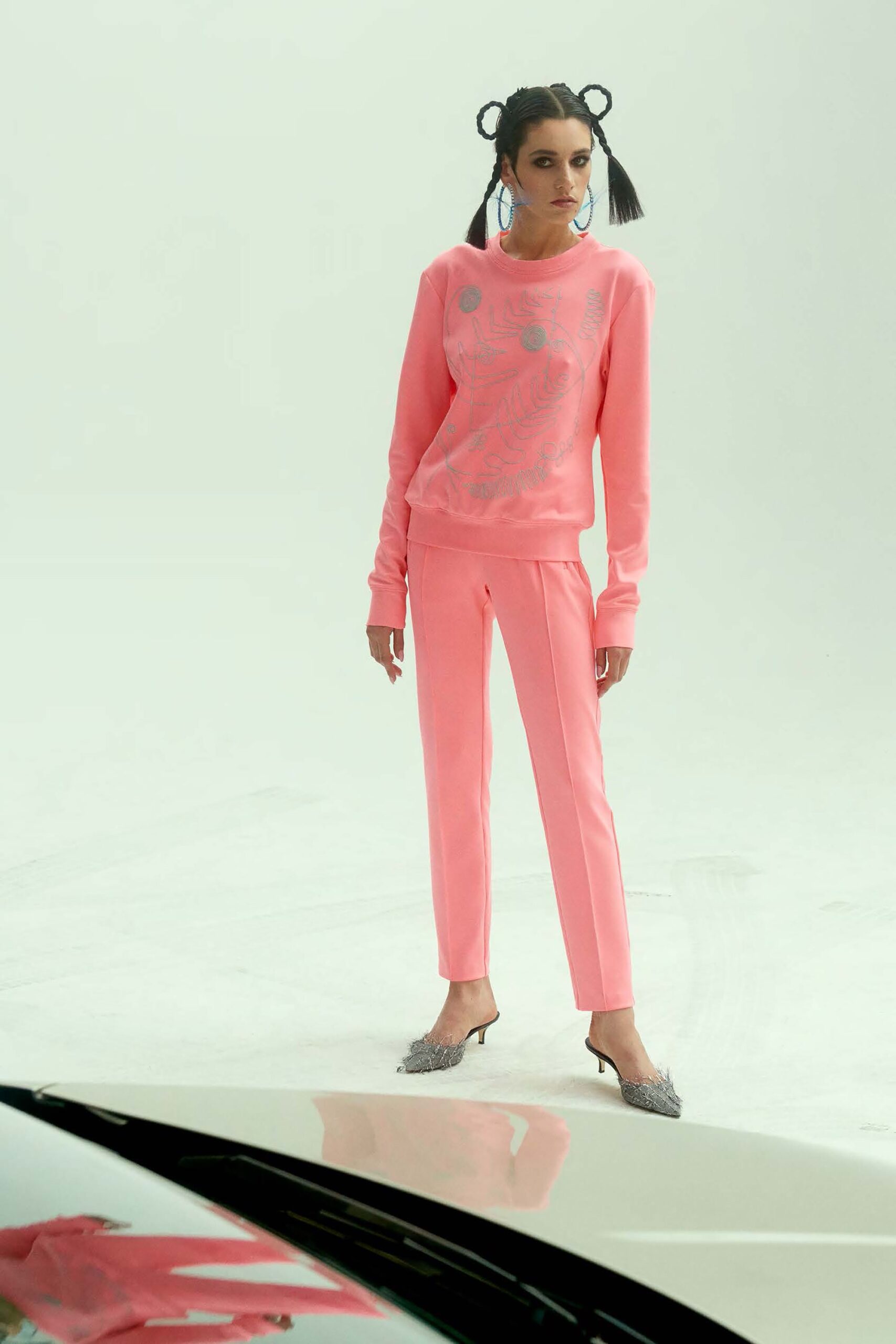 pink fitted sweater and pants