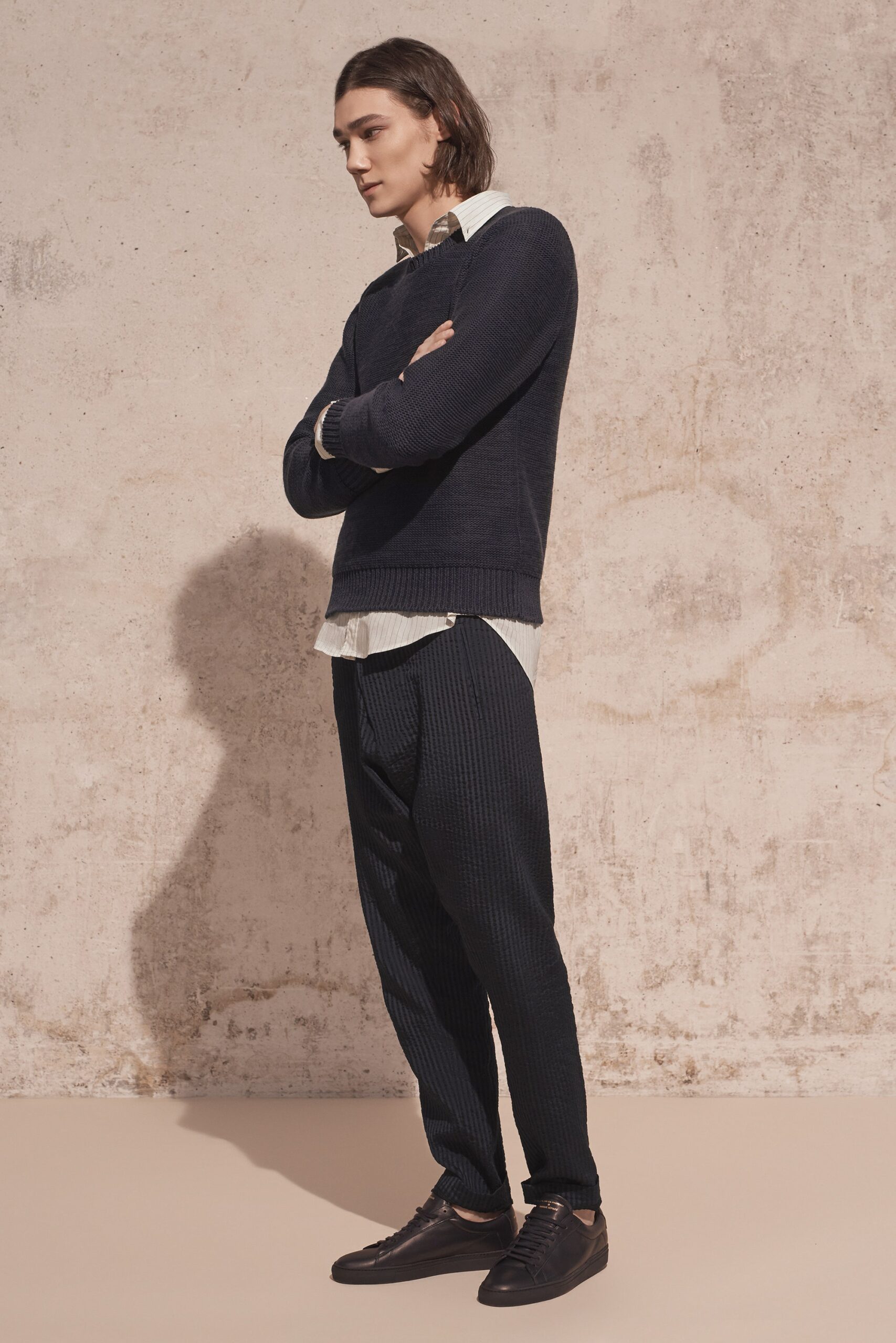 navy wool relaxed sweater with white shirt