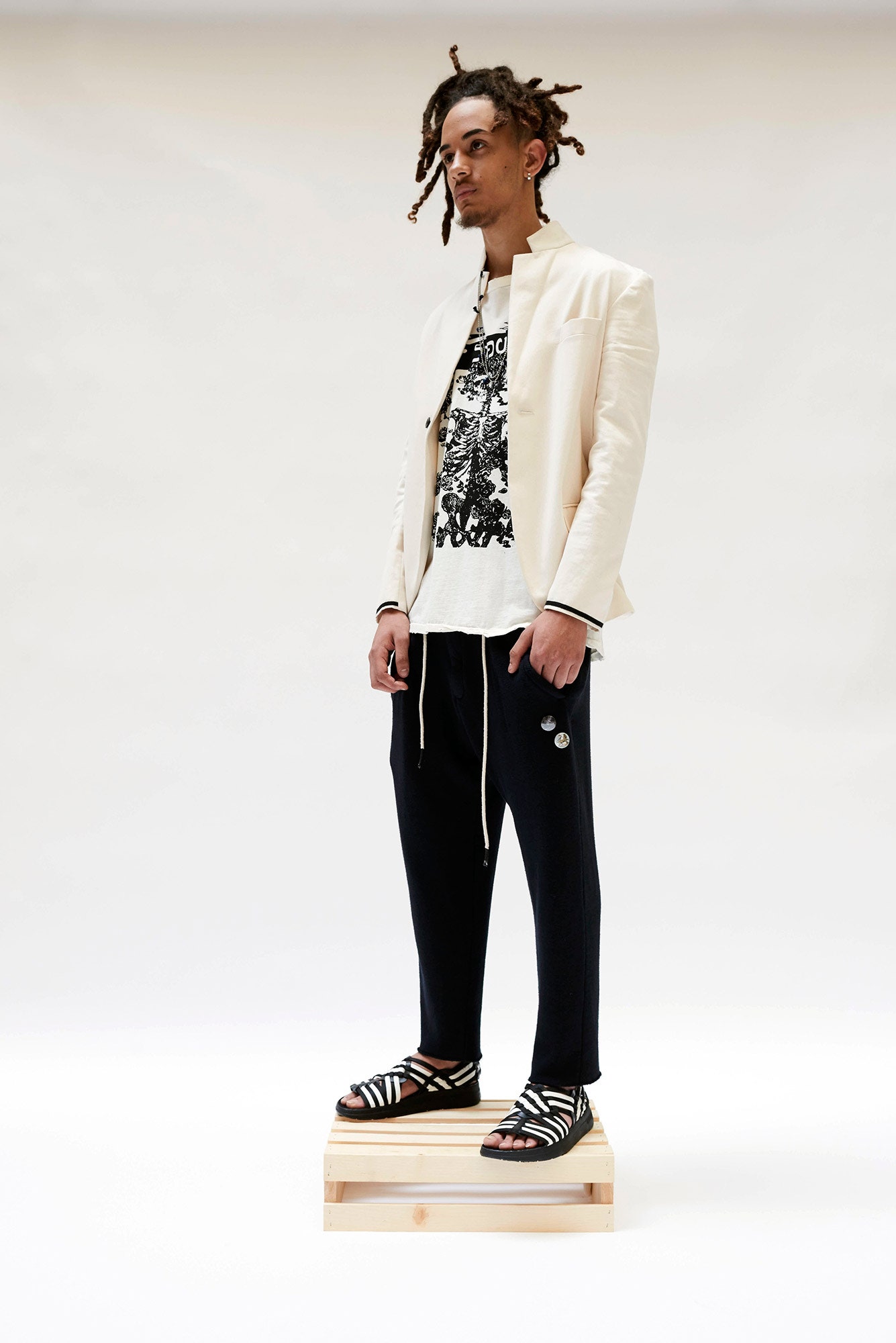 beige relaxed jacket with printed t-shirt