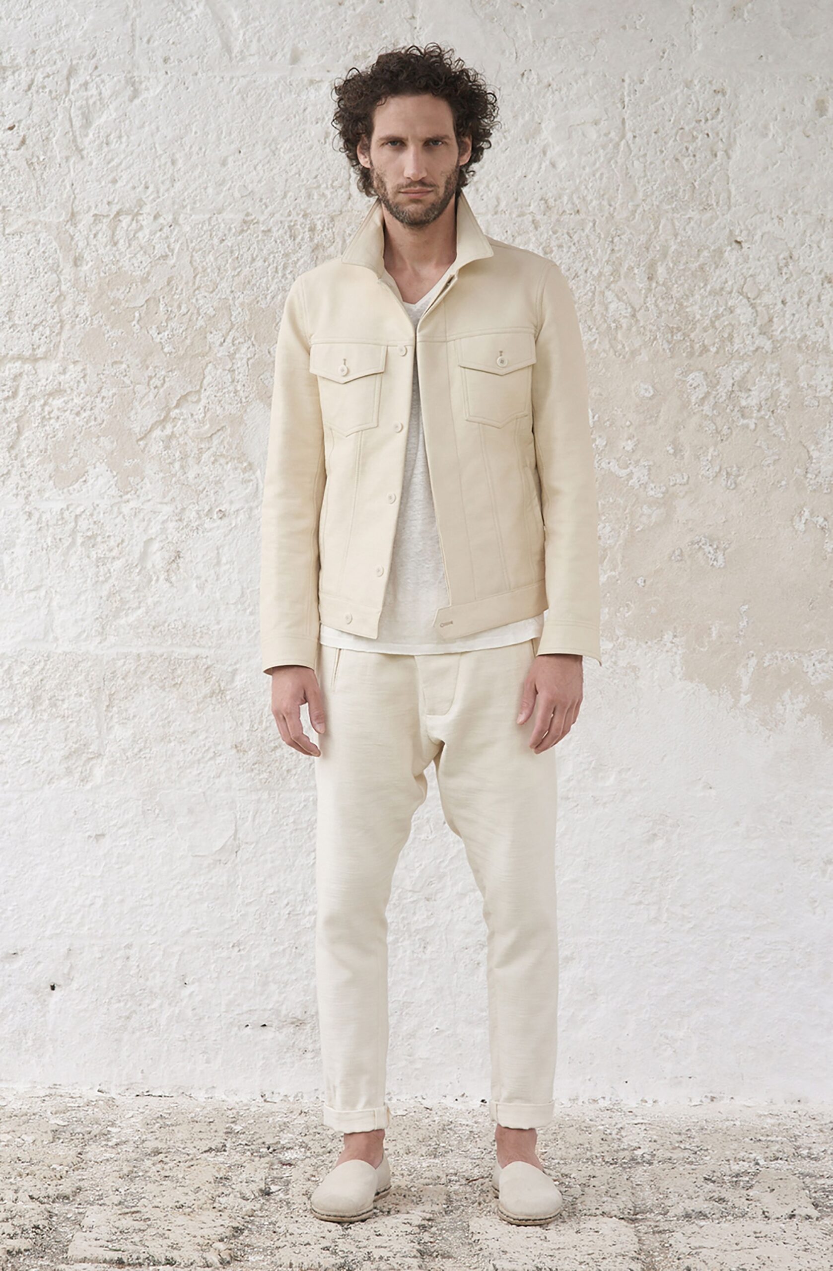 white fitted jacket with relaxed pants